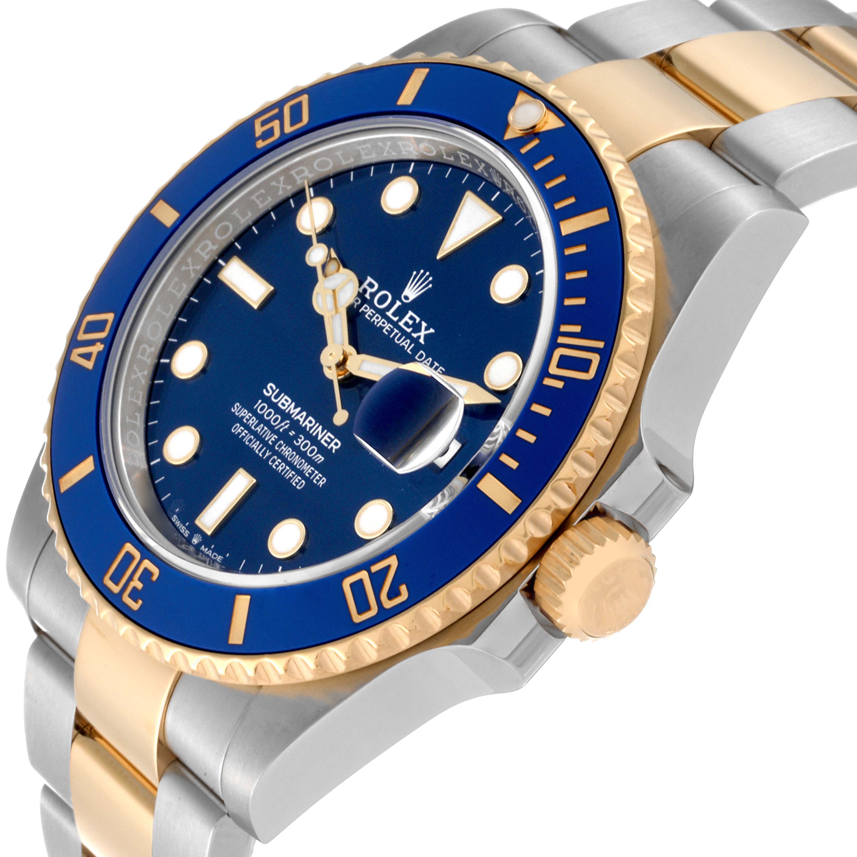 The Rolex Submariner 126613LB Men's Steel and Gold (two tone) Blue Dial 126613LB Men's Steel and Gold (two tone) Blue Dial watch is shown at a tilted angle highlighting the blue dial, gold bezel, and bracelet.