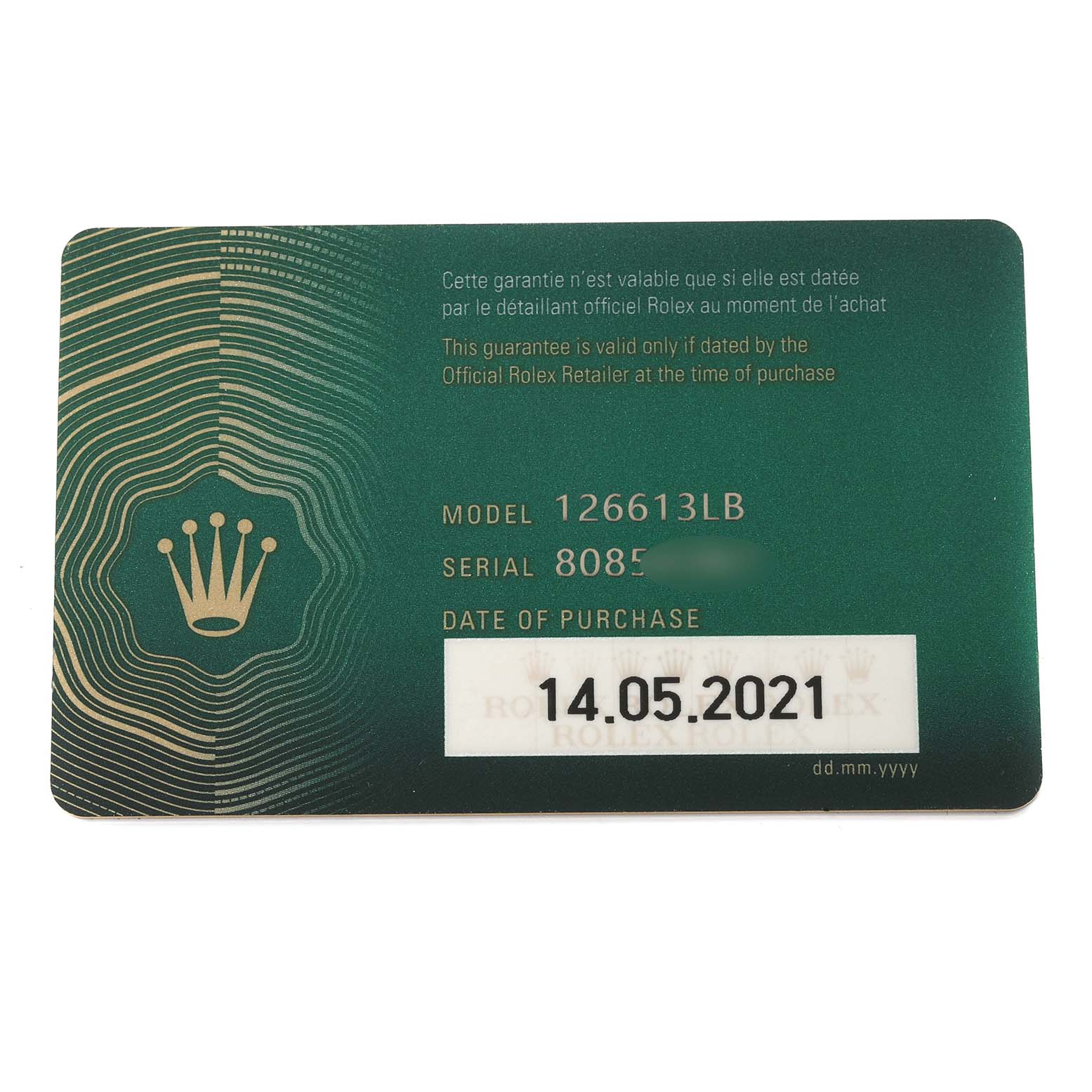 This image shows the guarantee card for a Rolex Submariner 126613LB Men's Steel and Gold (two tone) Blue Dial 126613LB Men's Steel and Gold (two tone) Blue Dial model 126613LB, including the serial number and purchase date.