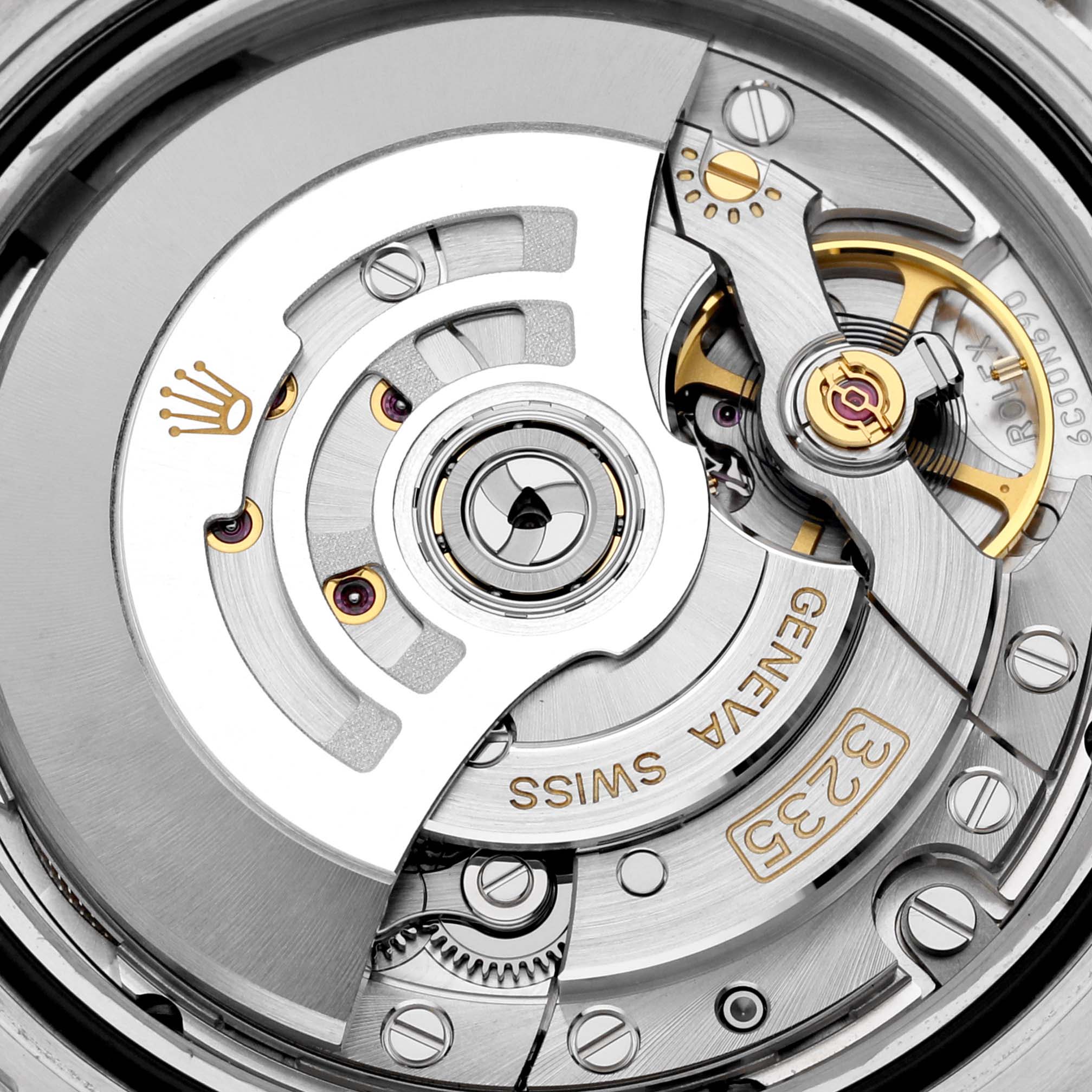 This image shows a close-up of the internal mechanical movement of a Rolex Submariner 126613LB Men's Steel and Gold (two tone) Blue Dial 126613LB Men's Steel and Gold (two tone) Blue Dial watch.
