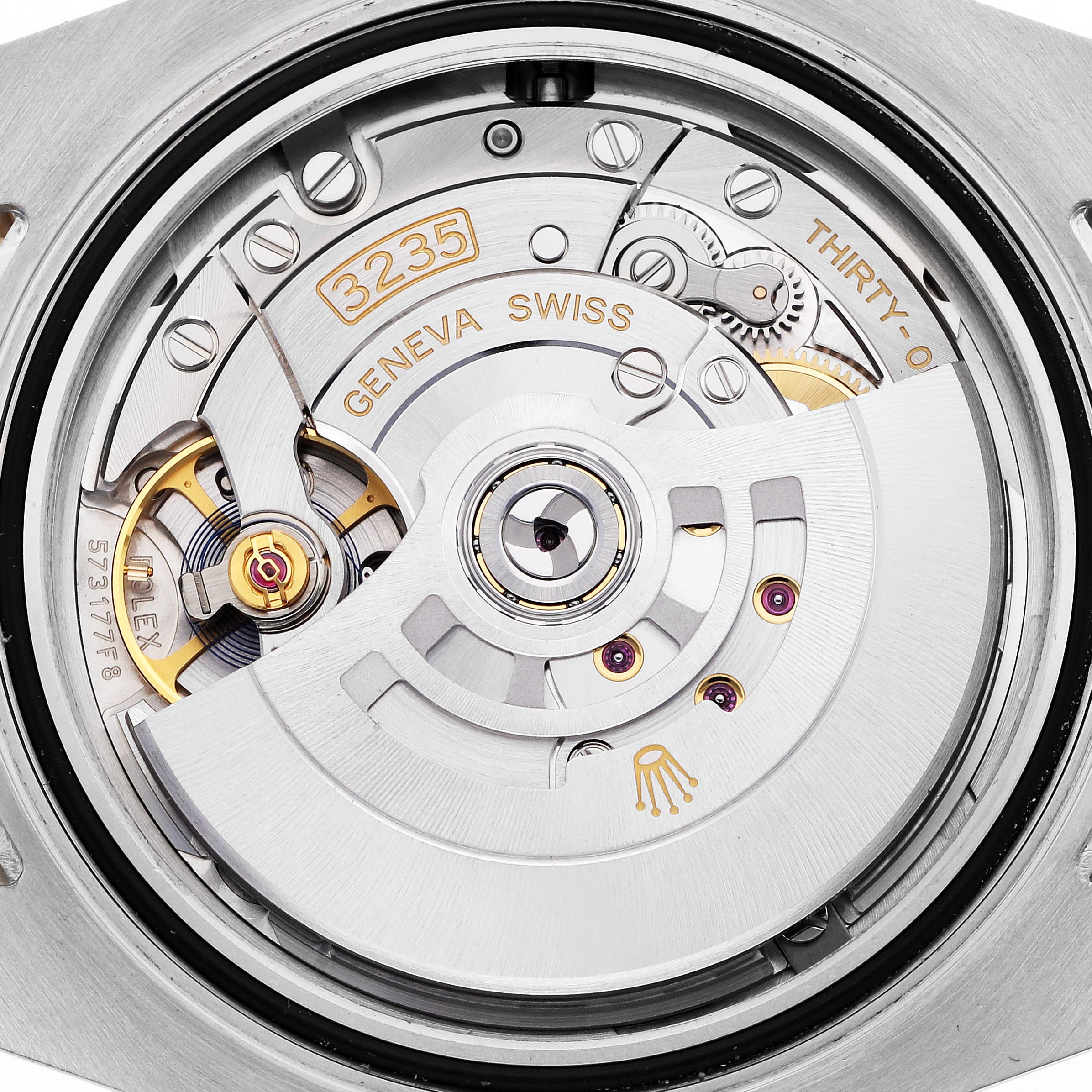 The image shows the movement of a Rolex Submariner 126613 Men
s Steel and Gold (two tone) Blue Dial 126613 Men
s Steel and Gold (two tone) Blue Dial, displaying its intricate internal mechanism from a back angle.