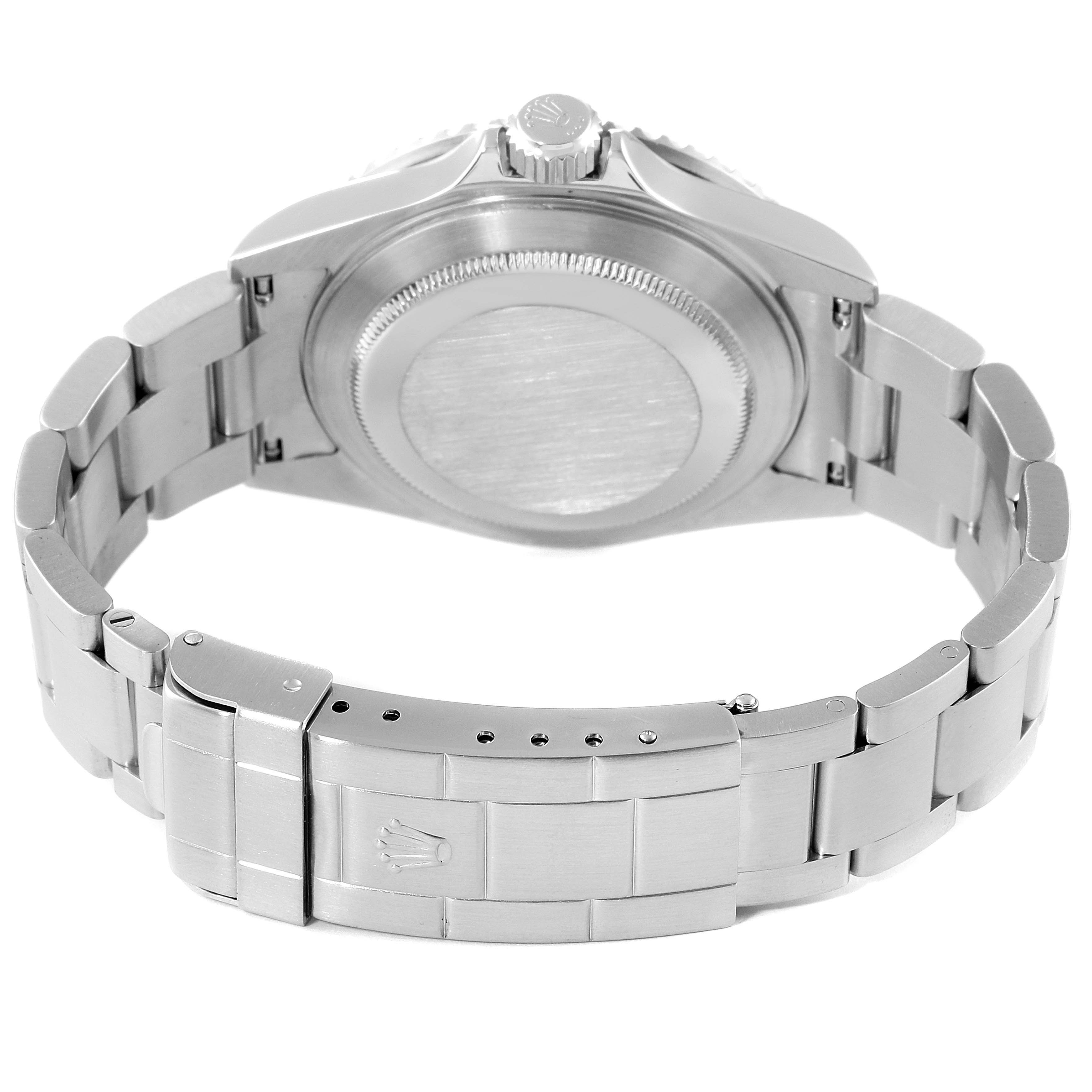 This image shows the backside of a Rolex Submariner 16610 Men
s Stainless Steel Black Dial 16610 Men
s Stainless Steel Black Dial watch, highlighting the case back and clasp.