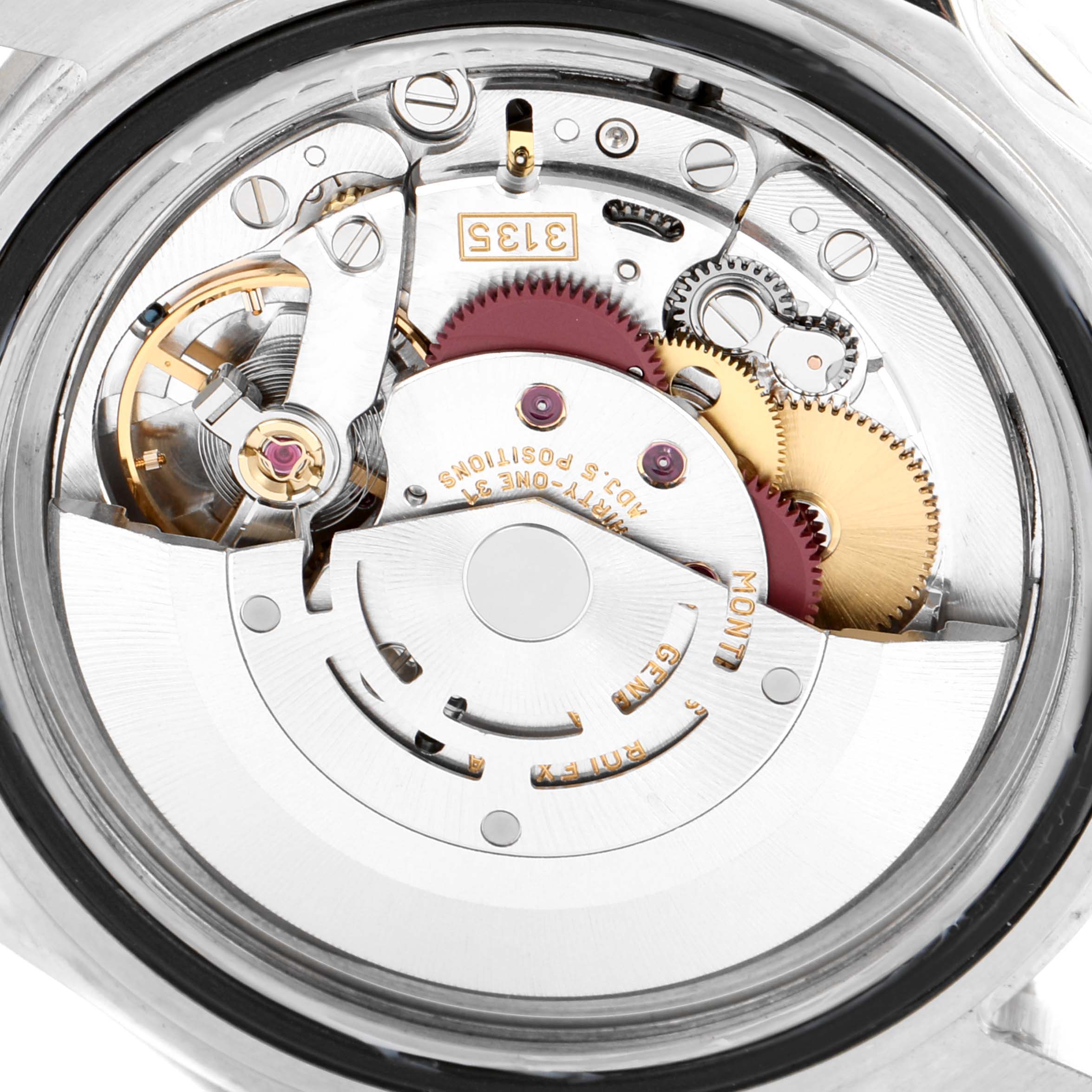 This image shows a close-up view of the movement inside a Rolex Submariner 16610 Men
s Stainless Steel Black Dial 16610 Men
s Stainless Steel Black Dial watch, highlighting the intricate gears and mechanical components.