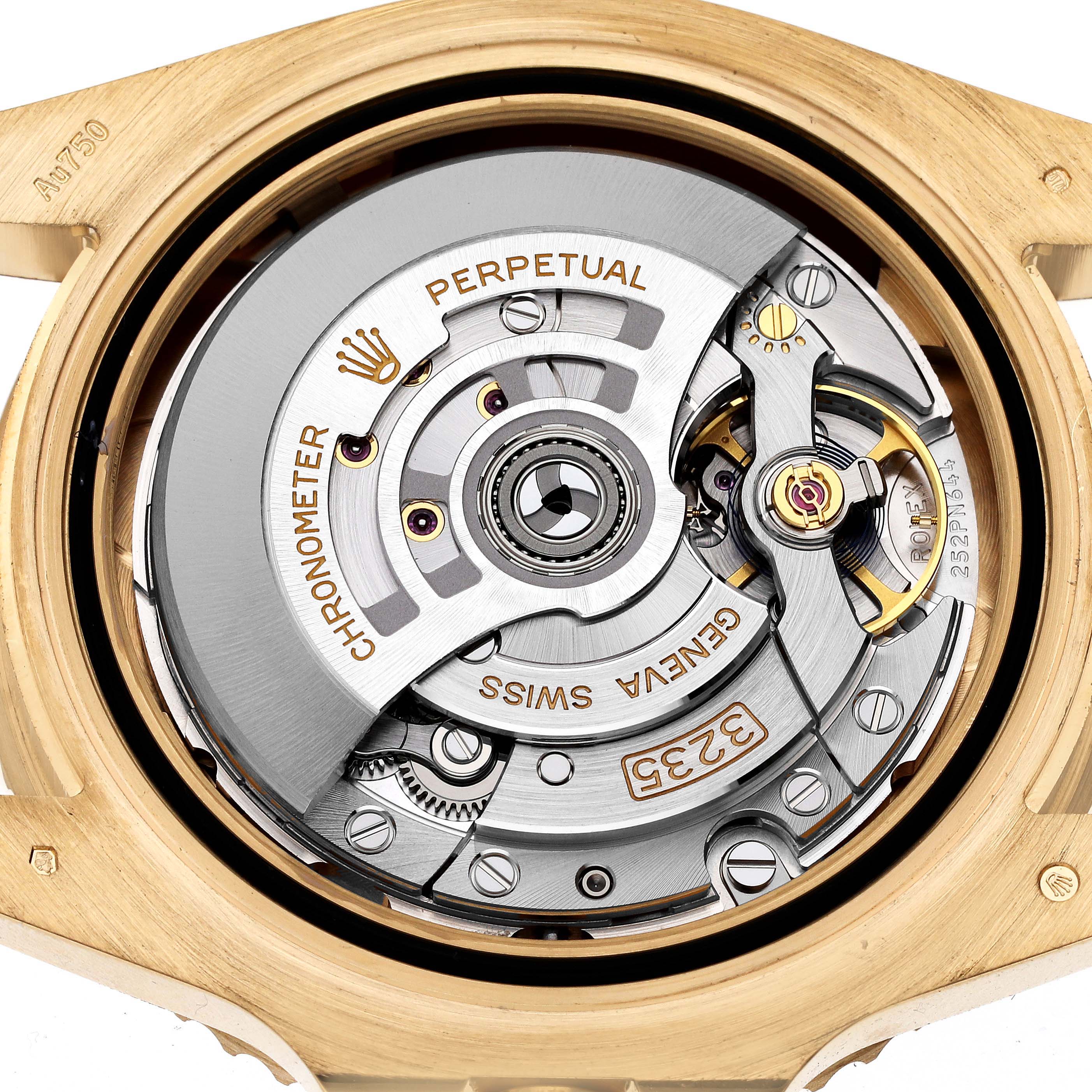 The image shows the open case-back view of a Rolex Submariner 126618LB Men's Yellow Gold Blue Dial 126618LB Men's Yellow Gold Blue Dial, revealing its intricate internal movement.