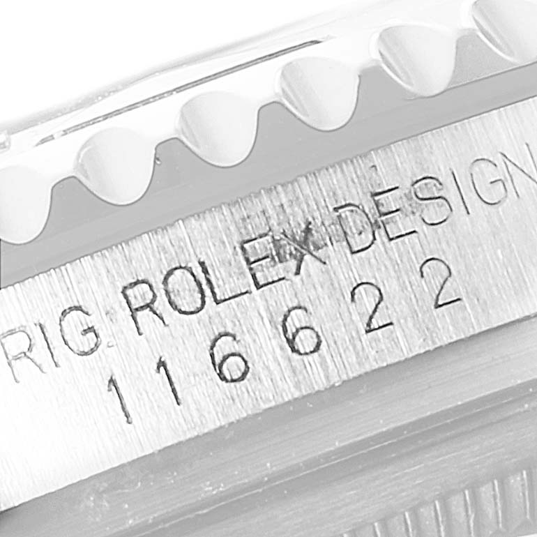 This close-up image of a Rolex Yacht-Master 116622 Men
s Stainless Steel Silver Dial 116622 Men
s Stainless Steel Silver Dial watch shows the model and brand engravings on the case.