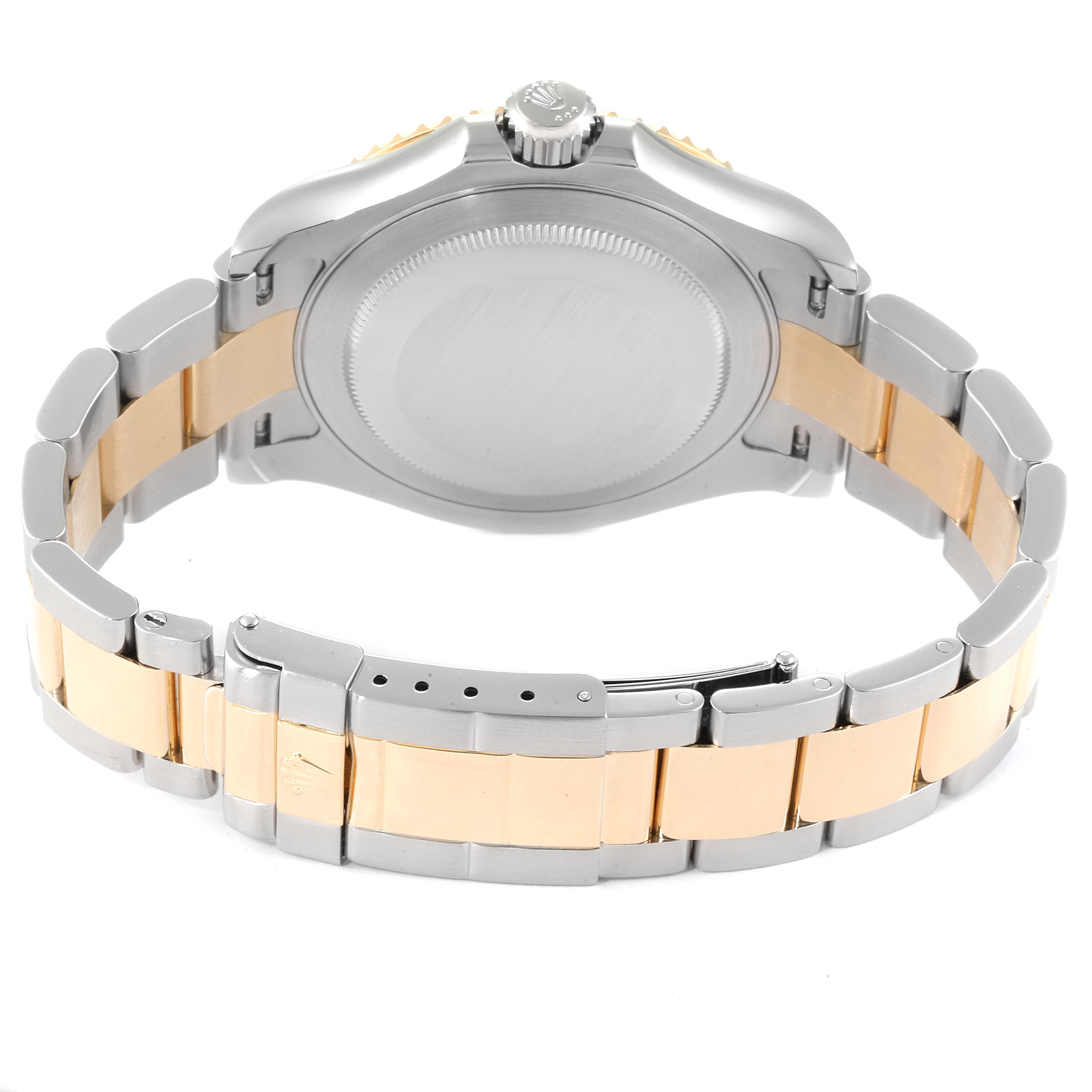 This image shows the back view of a Rolex Yacht-Master 16623 Men
s Steel and Gold (two tone) Blue Dial 16623 Men
s Steel and Gold (two tone) Blue Dial watch, highlighting the case, crown, and two-tone bracelet.