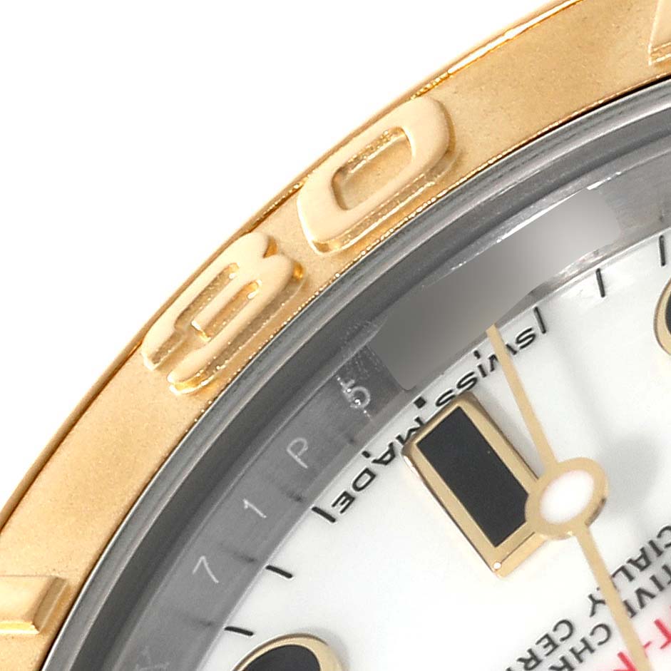 This image shows a close-up of the dial and bezel of a Rolex Yacht-Master 168623 Men's Steel and Gold (two tone) White Dial 168623 Men's Steel and Gold (two tone) White Dial model watch.