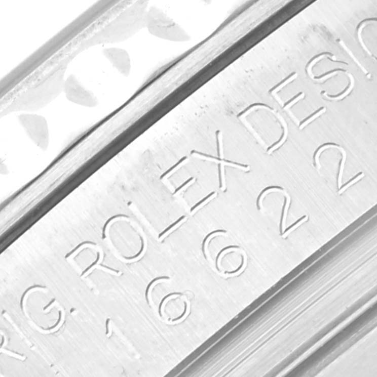 This image shows a close-up of the engravings on the side of a Rolex Yacht-Master 16622 Men's Stainless Steel Silver Dial 16622 Men's Stainless Steel Silver Dial watch case.