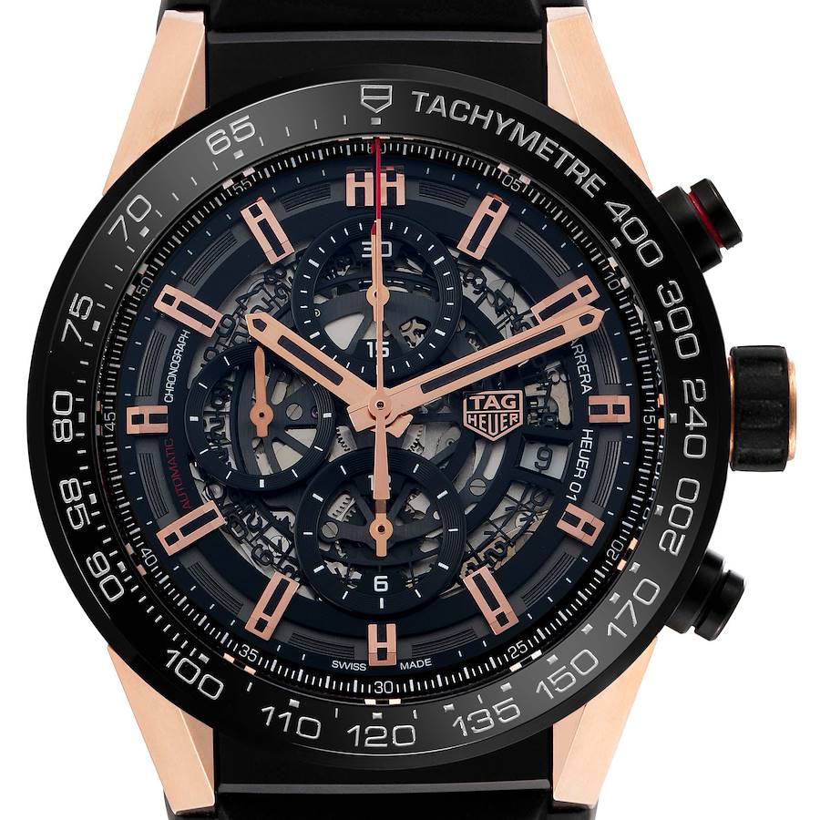 The image shows the front view of a Tag Heuer Carrera watch, highlighting the skeleton dial and tachymeter bezel.