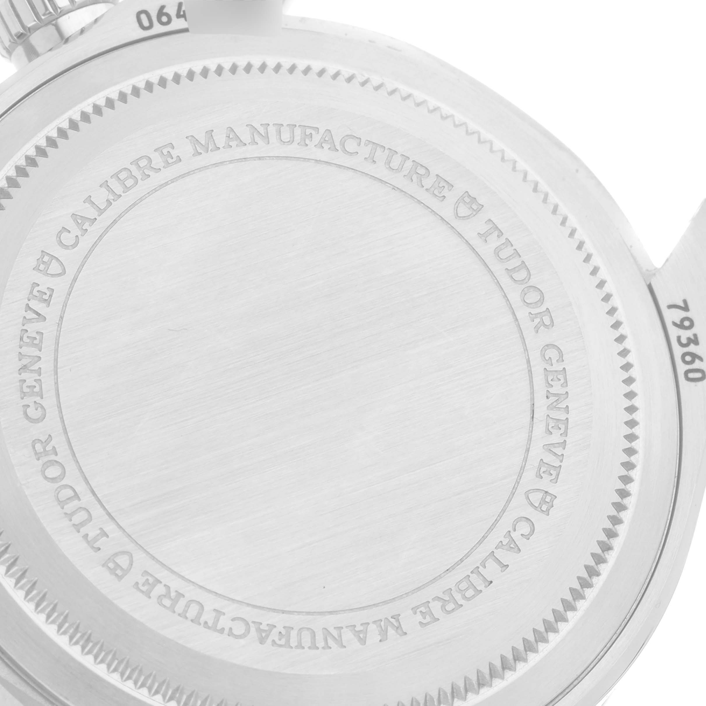 The image shows the rear case of the Tudor Heritage Black Bay 79360N Men's Stainless Steel Silver Dial 79360N Men's Stainless Steel Silver Dial watch, featuring engravings and model details.