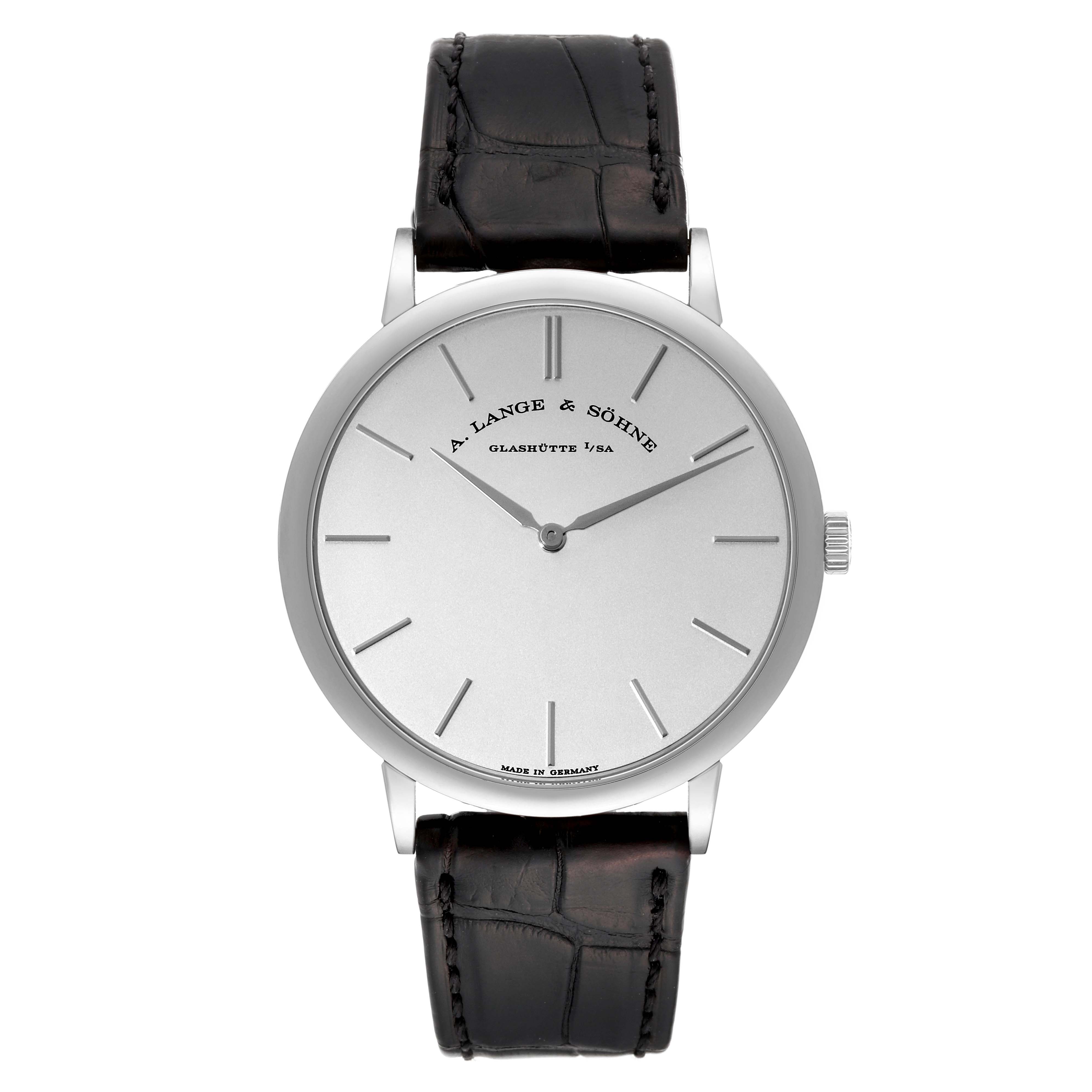 The image shows a front view of the A. Lange 
Sohne Saxonia 211.027 Men
s White Gold Silver Dial watch, displaying its dial, hands, crown, and leather strap.