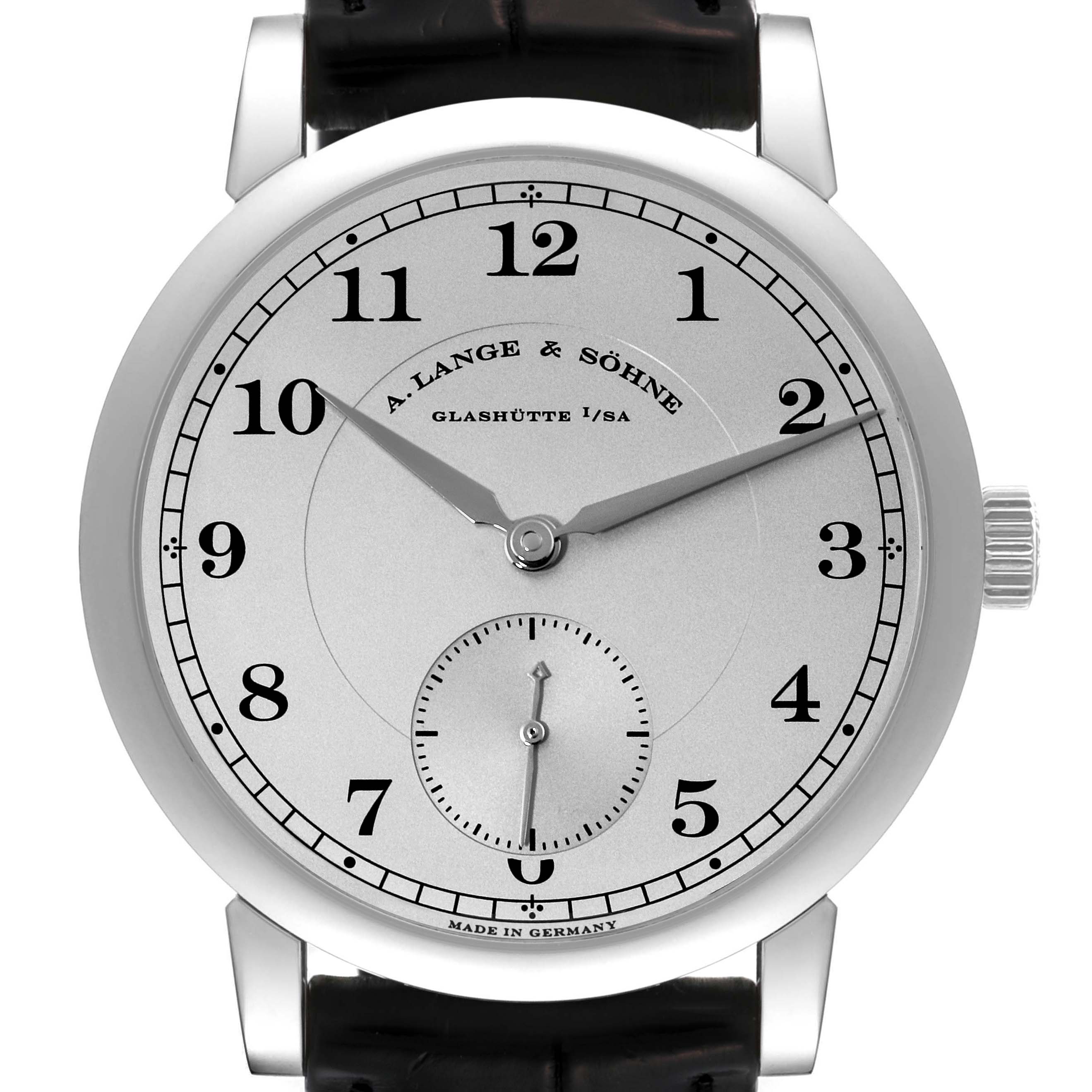 The image shows the face of an A. Lange & Sohne 1815 233.025 Men's Platinum Silver Dial watch, displaying its dial, hour markers, hands, and part of the strap.