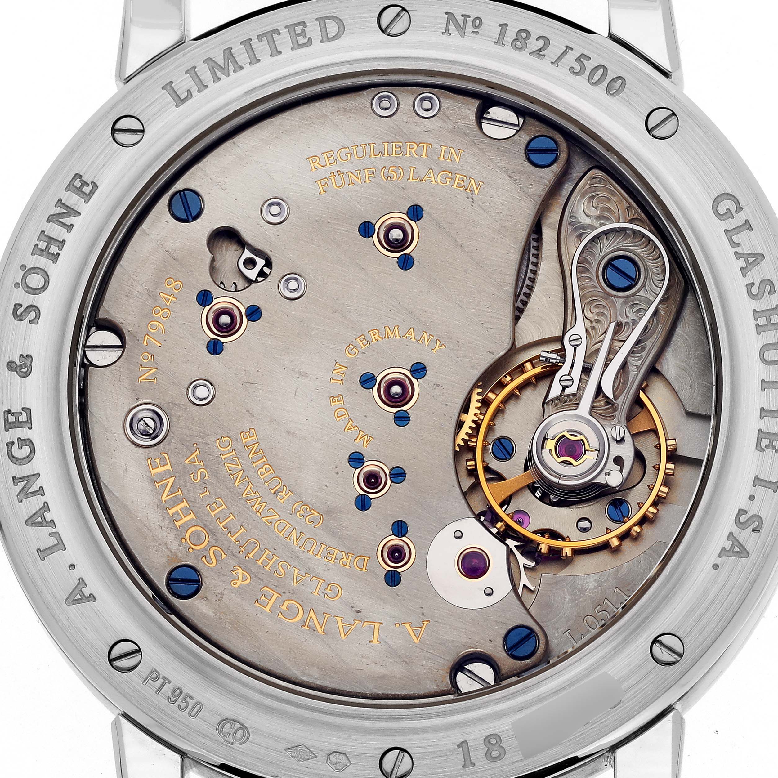 This image shows the back view of the A. Lange & Sohne 1815 233.025 Men's Platinum Silver Dial watch, highlighting its intricate movement and craftsmanship.