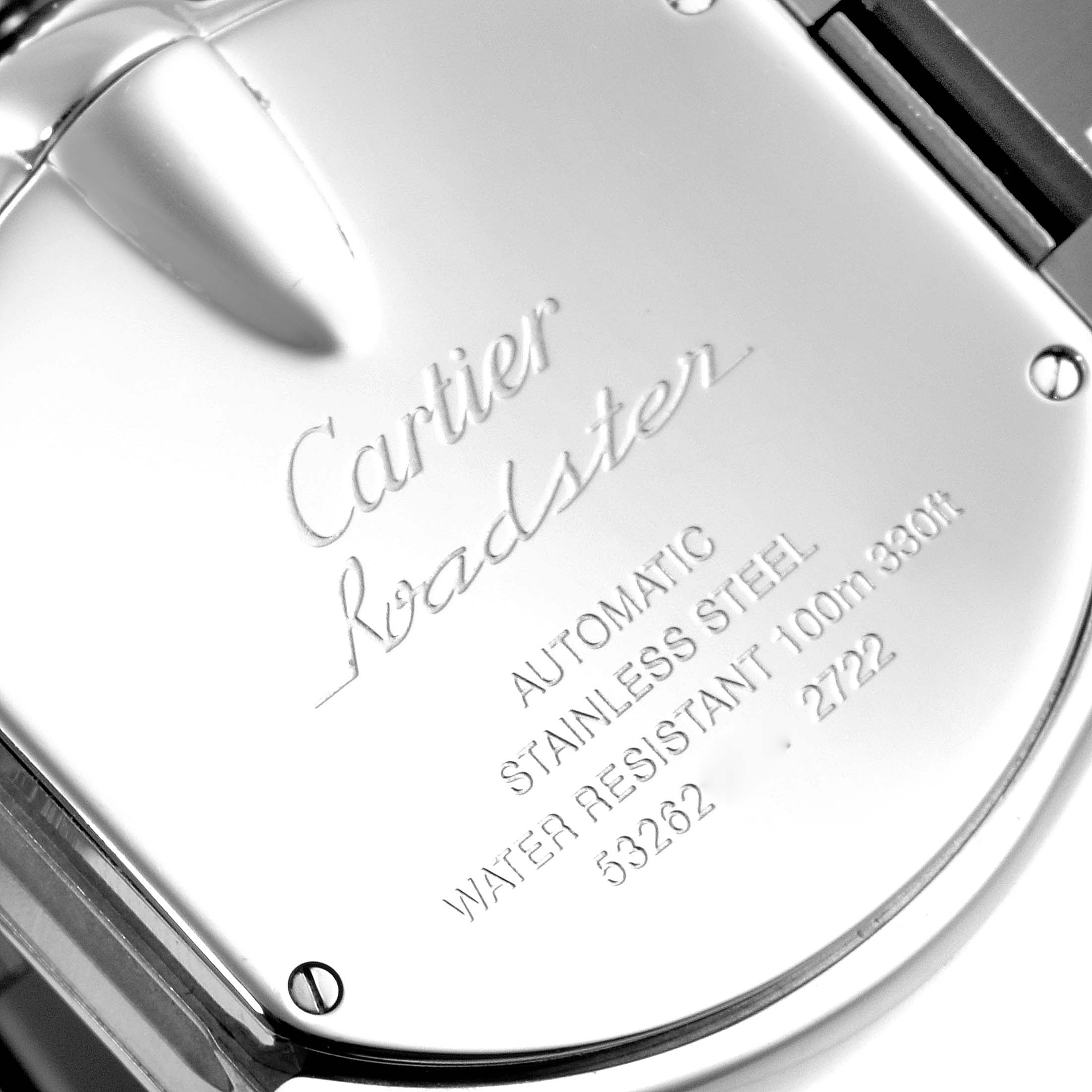 The image shows the back case of a Cartier Roadster W62032X6 Men's Stainless Steel Silver Dial W62032X6 Men's Stainless Steel Silver Dial watch, focusing on the engraved details.