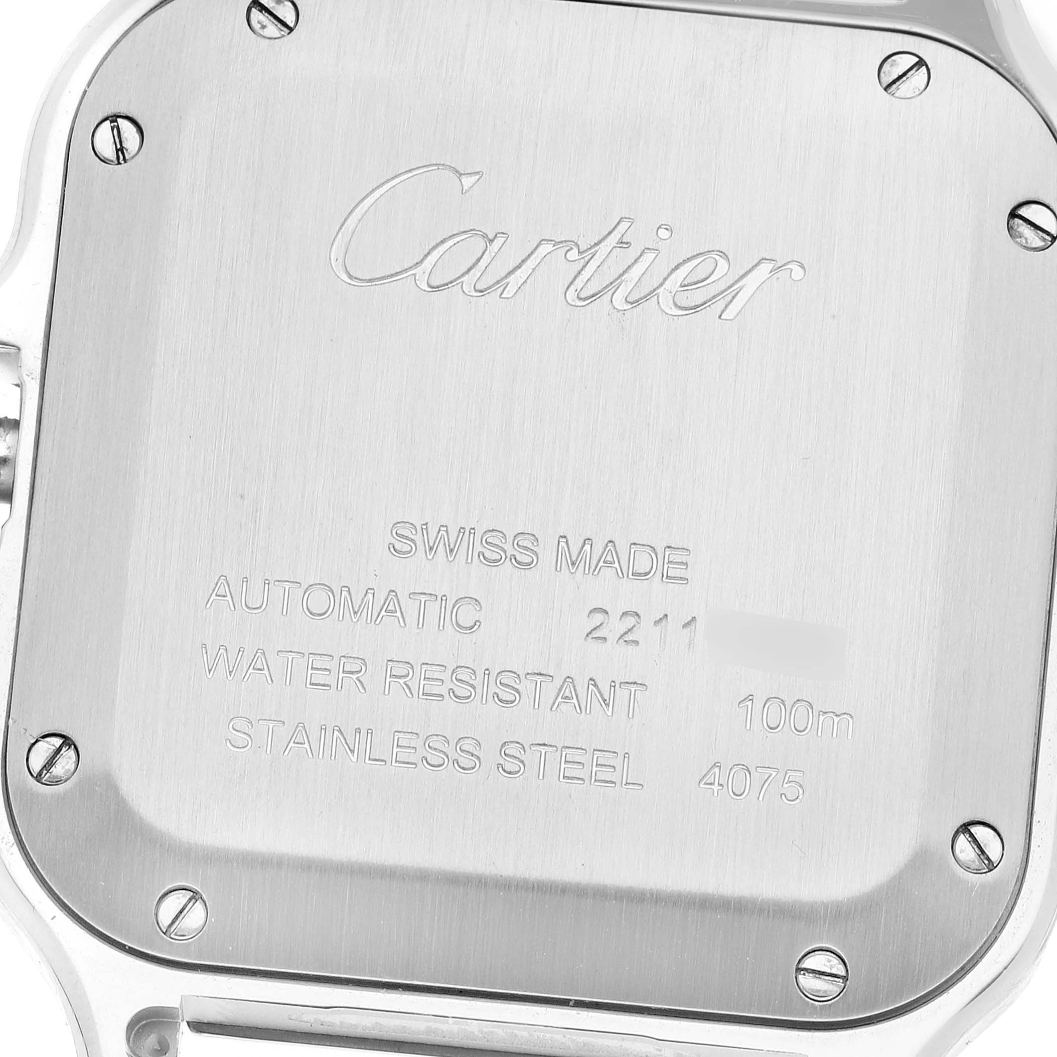 The image shows the back case of a Cartier Santos W4SA0005 Men
s Stainless Steel Silver Dial W4SA0005 Men
s Stainless Steel Silver Dial watch, highlighting its engravings and screws.