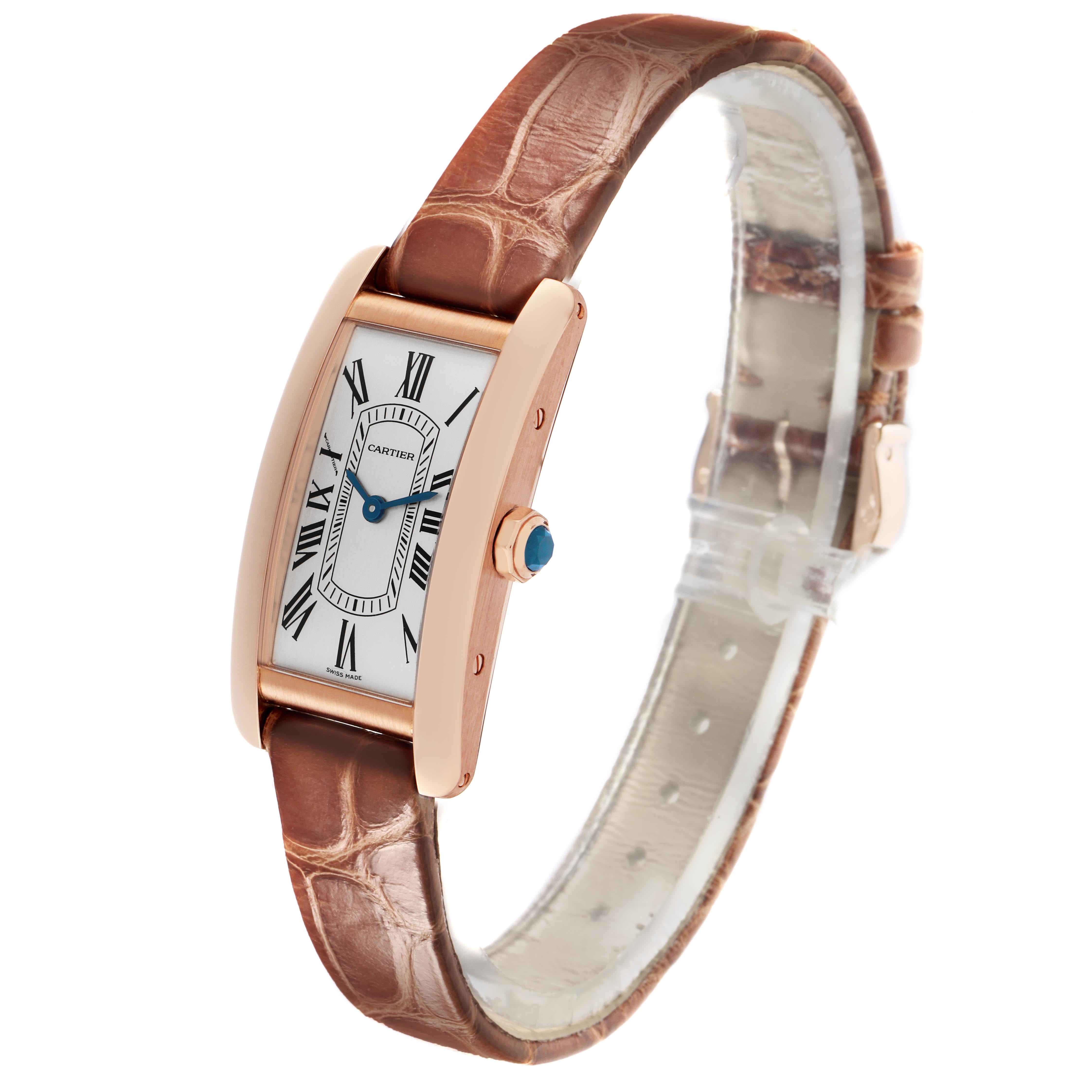 The Cartier Tank Américaine watch is shown at a three-quarter angle, highlighting its face, case, crown, and leather strap.