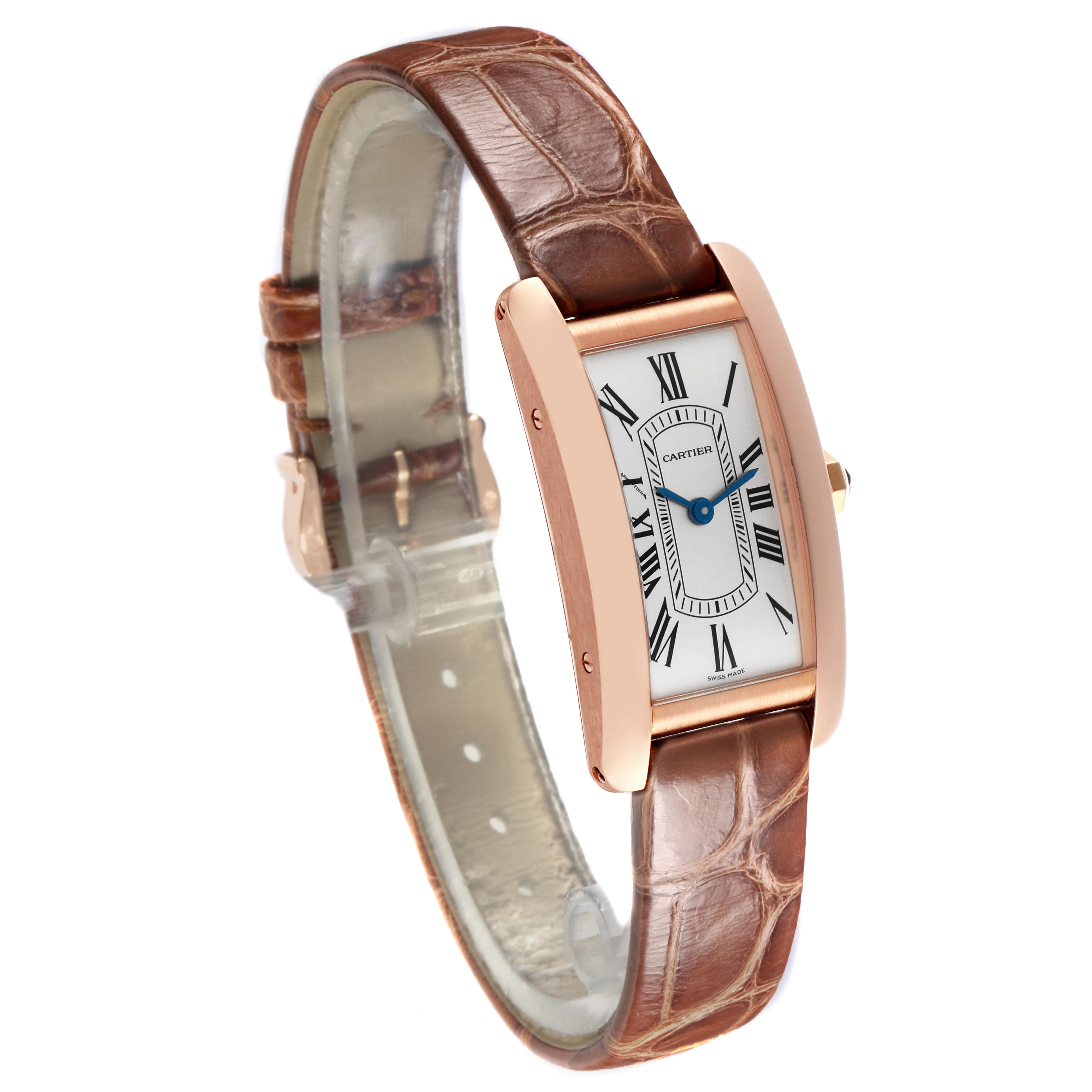 The Cartier Tank Americaine W2607456 Women
s Rose Gold Silver Dial W2607456 Women
s Rose Gold Silver Dial is shown at a three-quarter angle, highlighting the rectangular case, dial with Roman numerals, and brown leather strap.