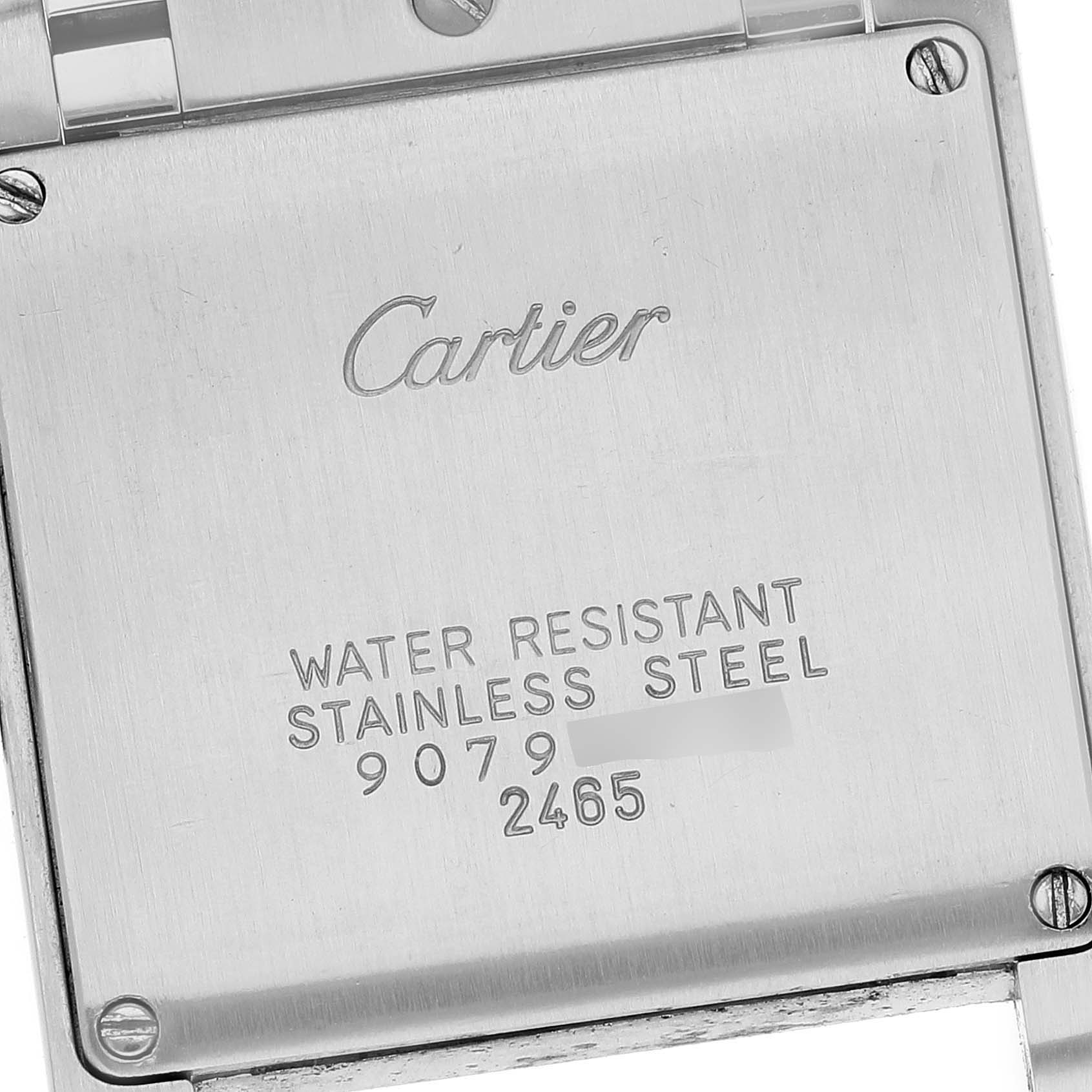 The image shows the back case of a Cartier Tank Francaise W51011Q3 Women's Stainless Steel Silver Dial W51011Q3 Women's Stainless Steel Silver Dial watch, highlighting the brand's engraving and specifications.