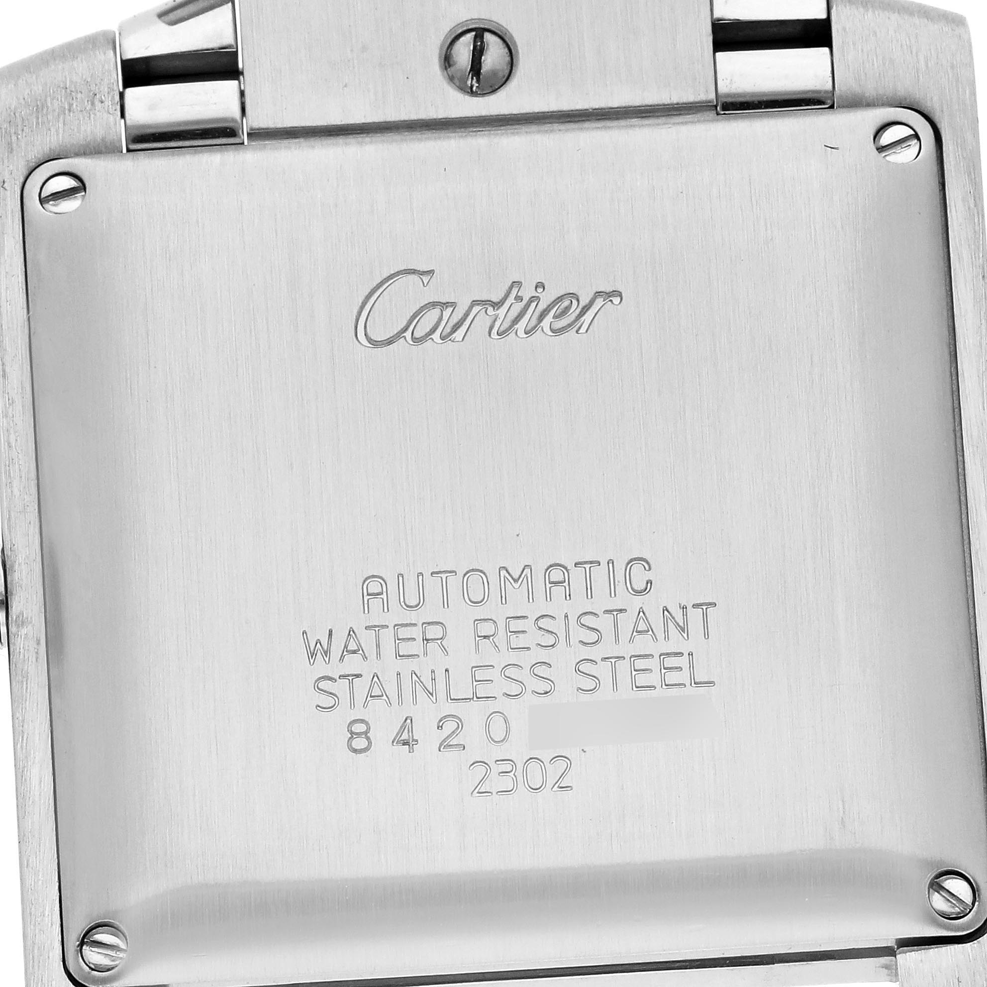 The image shows the back case of a Cartier Tank Francaise W51005Q4 Men
s Steel and Gold (two tone) Silver Dial W51005Q4 Men
s Steel and Gold (two tone) Silver Dial, highlighting its branding and specifications.