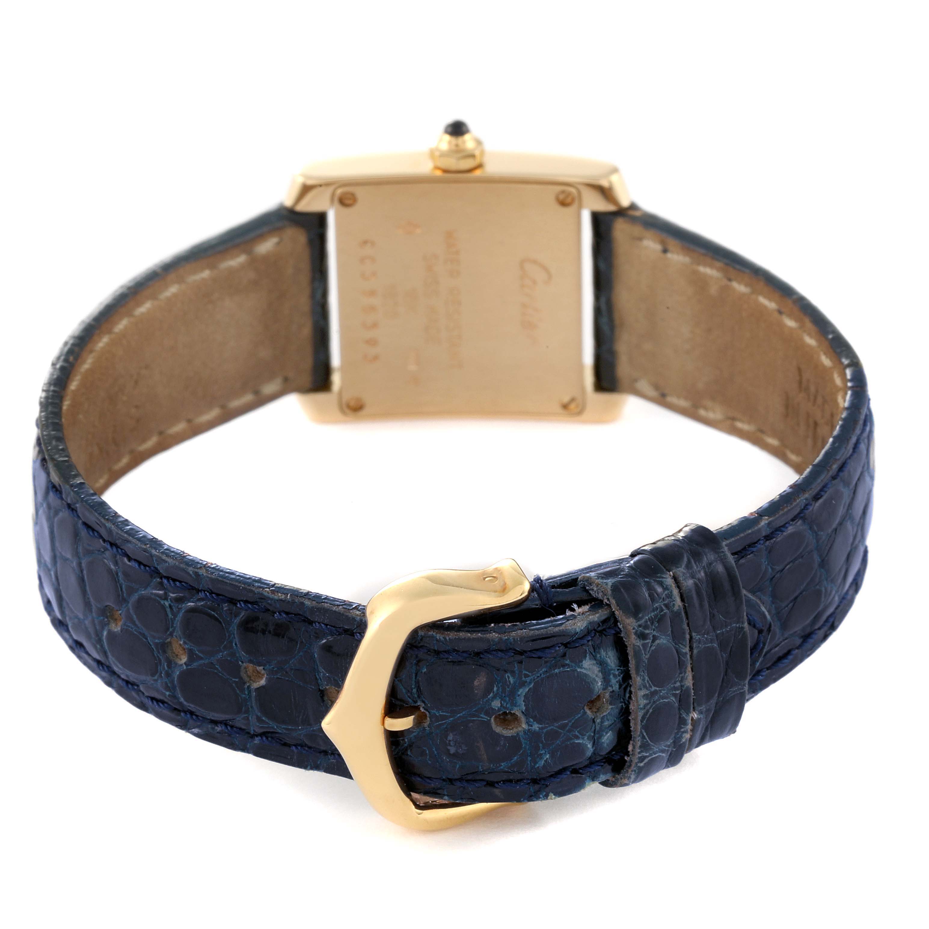 The image shows the back view of a Cartier Tank Francaise W5000256 Women's Yellow Gold Silver Dial W5000256 Women's Yellow Gold Silver Dial watch, highlighting the case back, strap, and buckle.