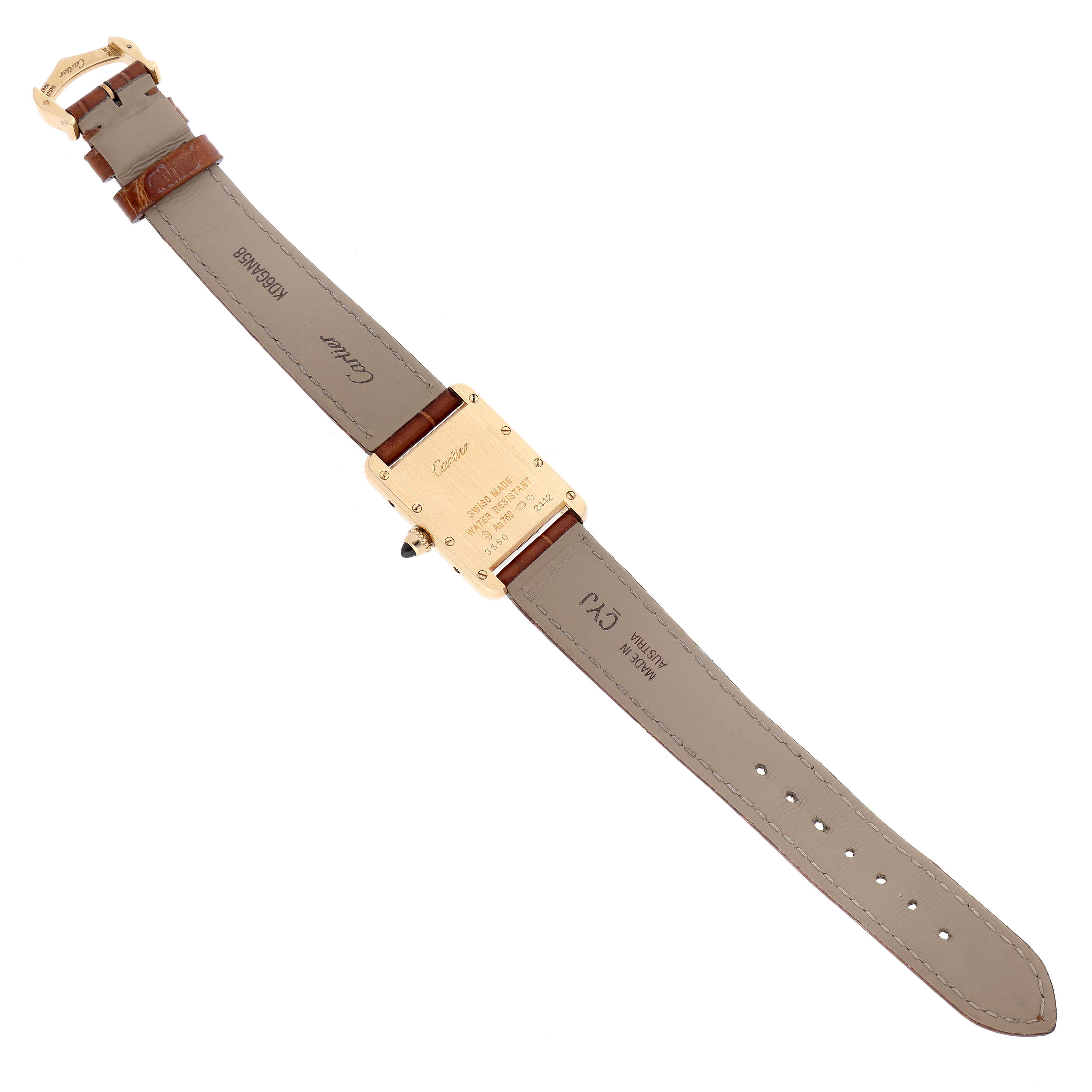 This image shows the back view of the Tank Louis model watch by Cartier, highlighting the leather strap and case back.