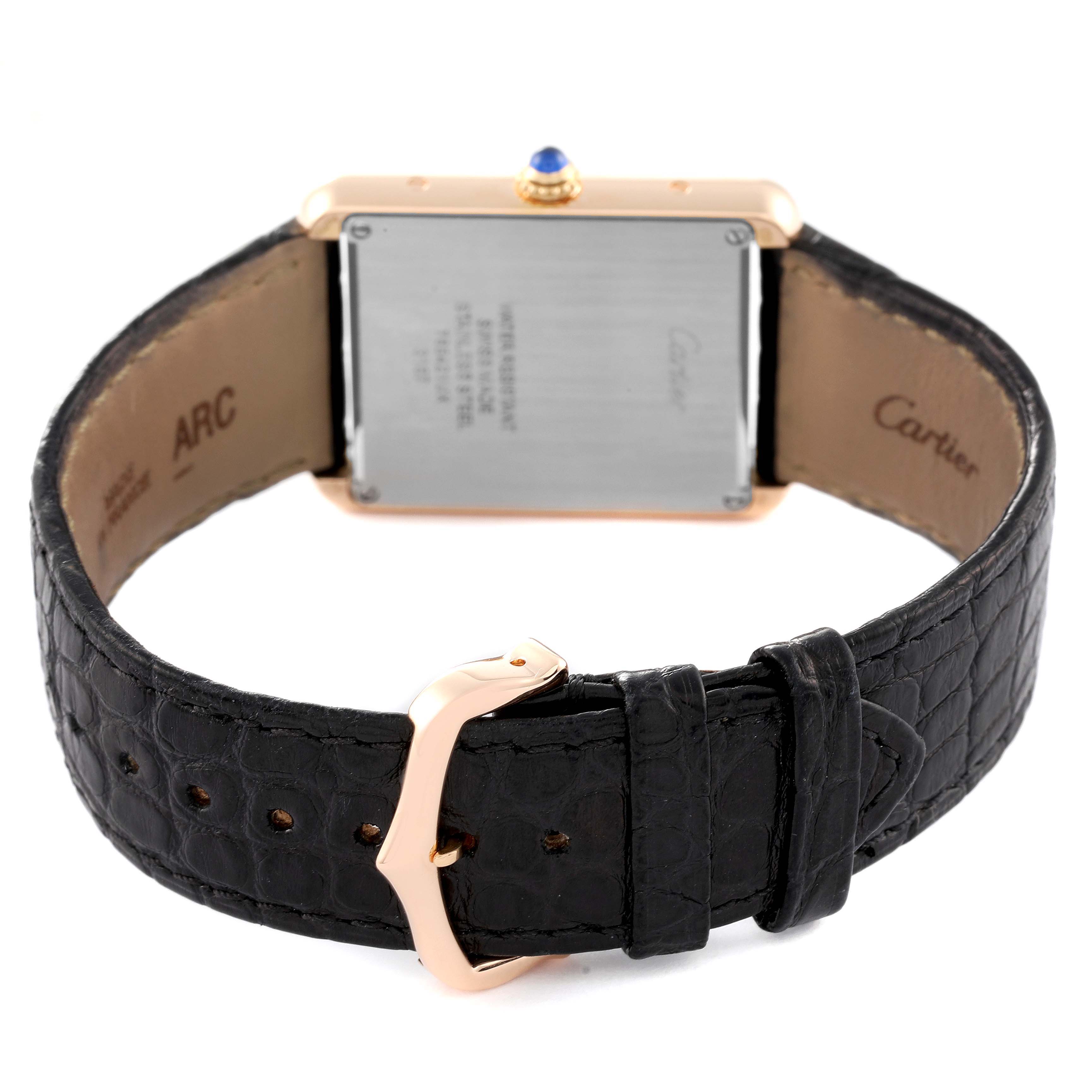 The image shows the back view of a Cartier Tank Solo W5200025 Men
s Yellow Gold Silver Dial W5200025 Men
s Yellow Gold Silver Dial watch, featuring its case back, black leather strap, and buckle.