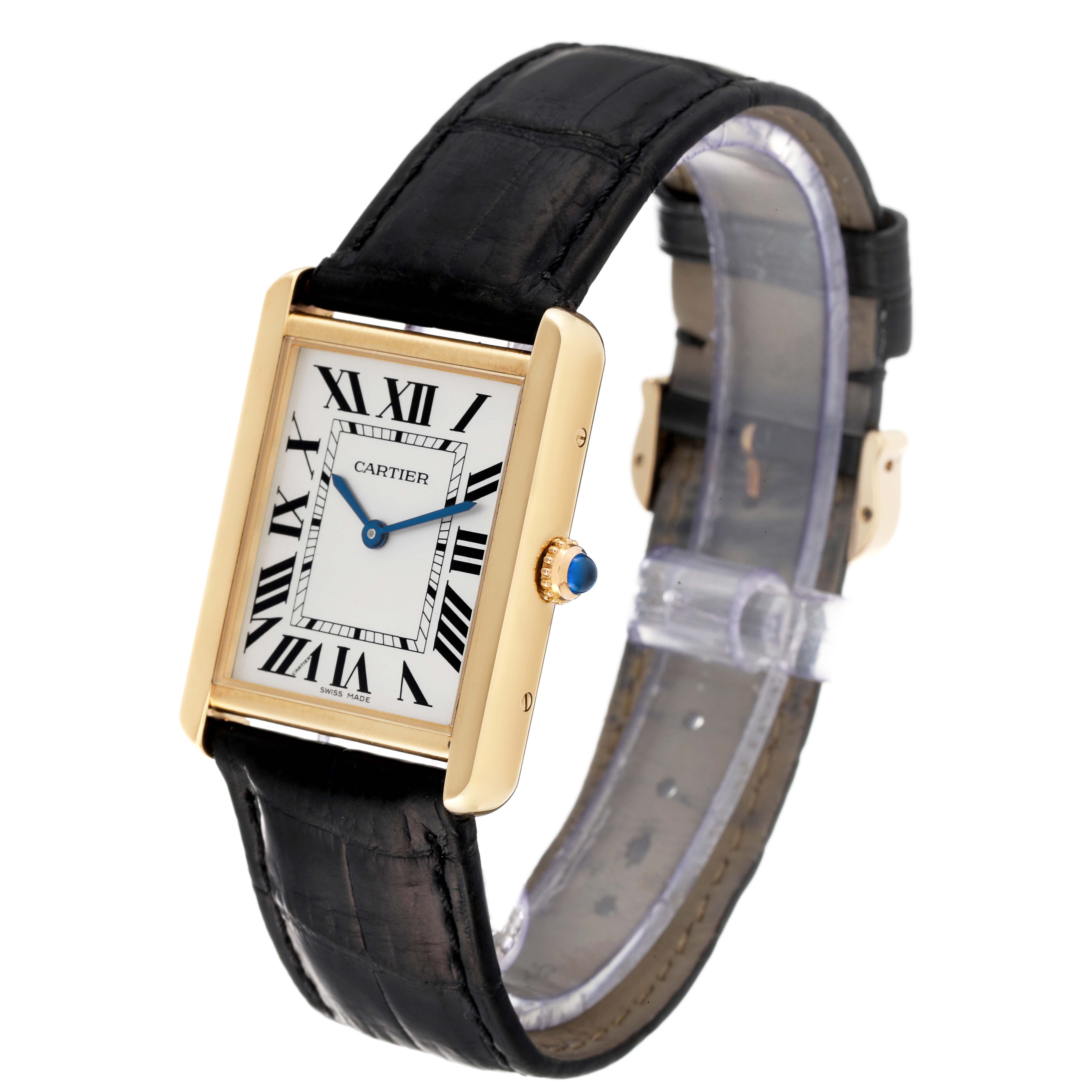 The image shows a Cartier Tank Solo W5200004 Men
s Yellow Gold Silver Dial W5200004 Men
s Yellow Gold Silver Dial watch at a three-quarter angle, highlighting the face, straps, and crown with a blue gemstone.