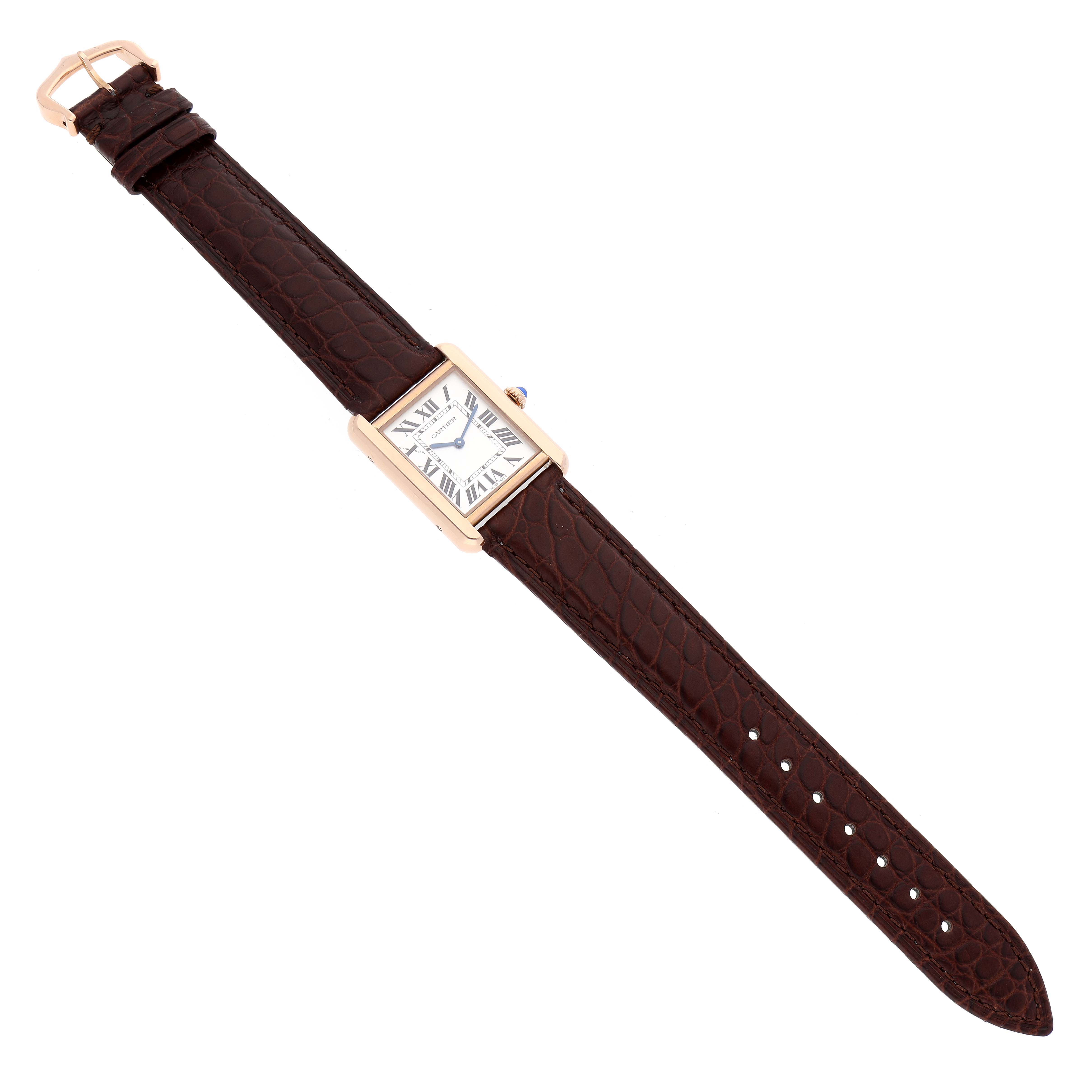The image shows an overhead view of the Cartier Tank Solo W5200024 Women
s Rose Gold Silver Dial W5200024 Women
s Rose Gold Silver Dial watch, displaying the entire rectangular case and brown leather strap.