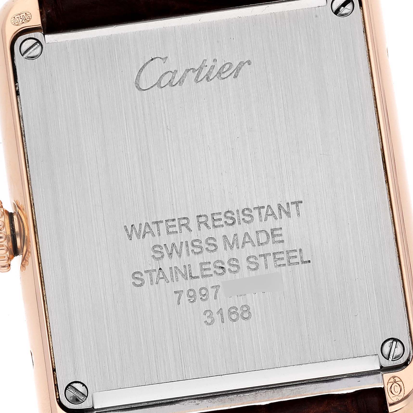 The image shows the back of a Cartier Tank Solo W5200024 Women
s Rose Gold Silver Dial W5200024 Women
s Rose Gold Silver Dial watch, including the brand name and specifications.