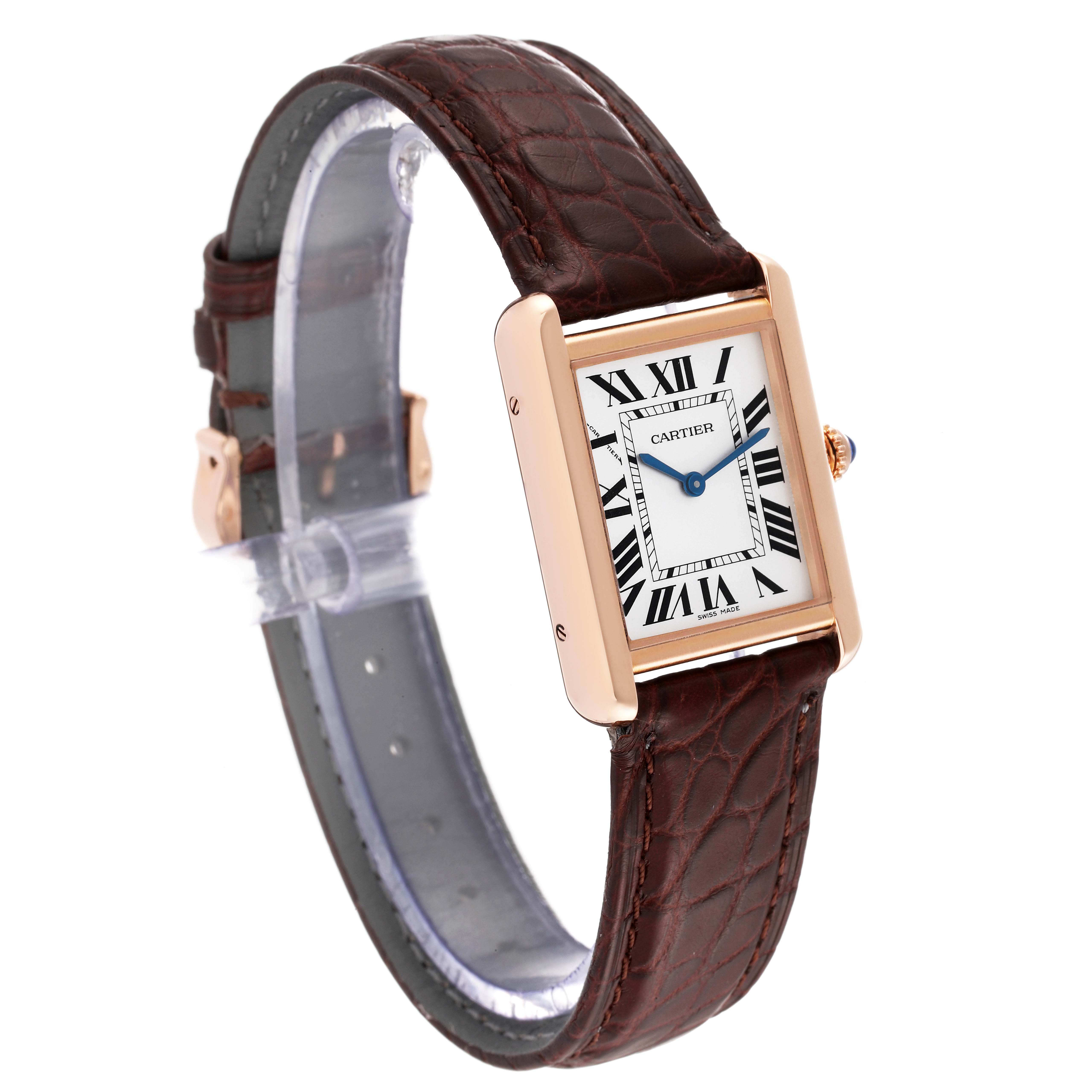 The image shows a Cartier Tank Solo W5200024 Women
s Rose Gold Silver Dial W5200024 Women
s Rose Gold Silver Dial watch from an angled side view, highlighting its rectangular face and brown leather strap.