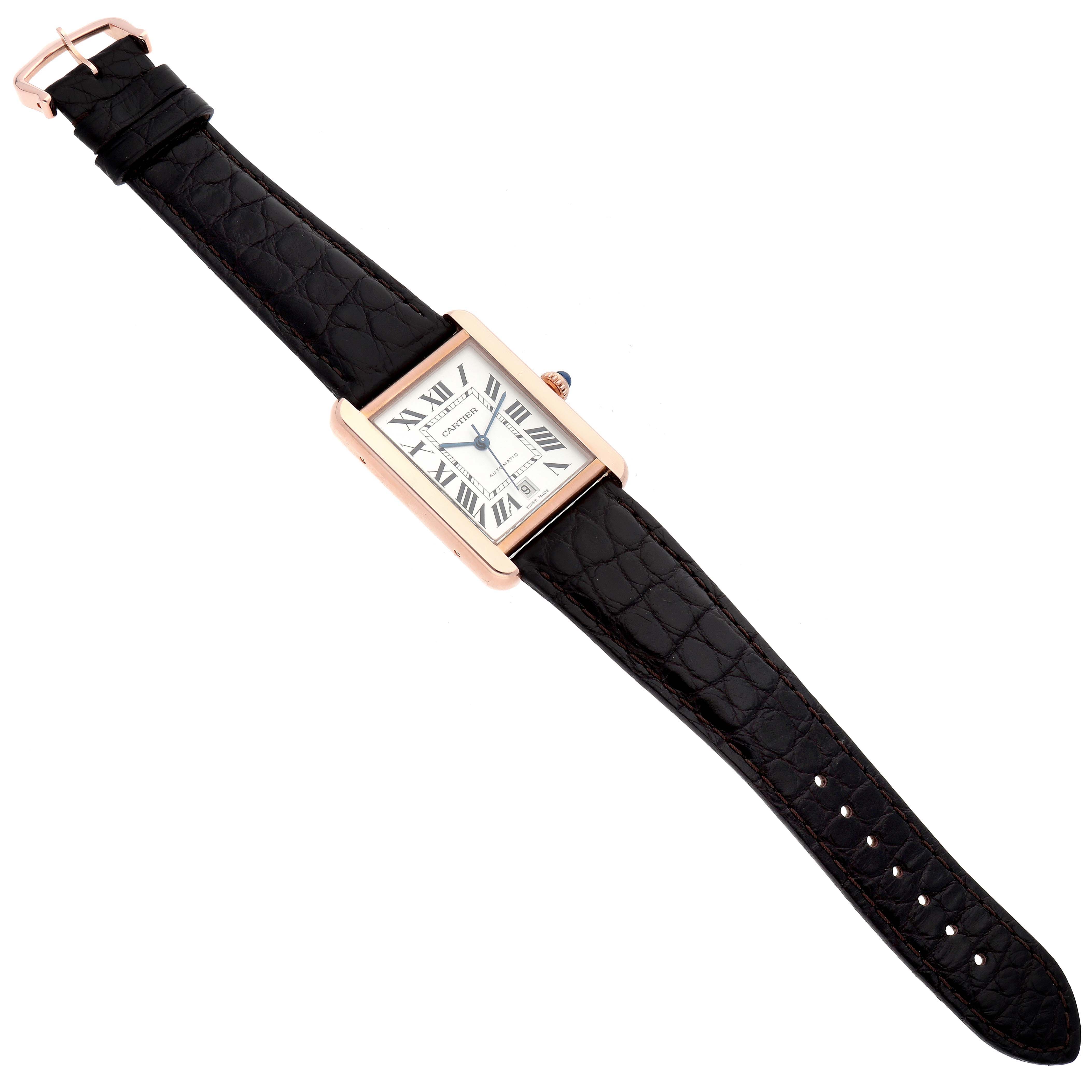 The image shows a top-down view of a Cartier Tank Solo W5200026 Men
s Steel and Gold (two tone) Silver Dial W5200026 Men
s Steel and Gold (two tone) Silver Dial watch with a black leather strap and a rectangular face.