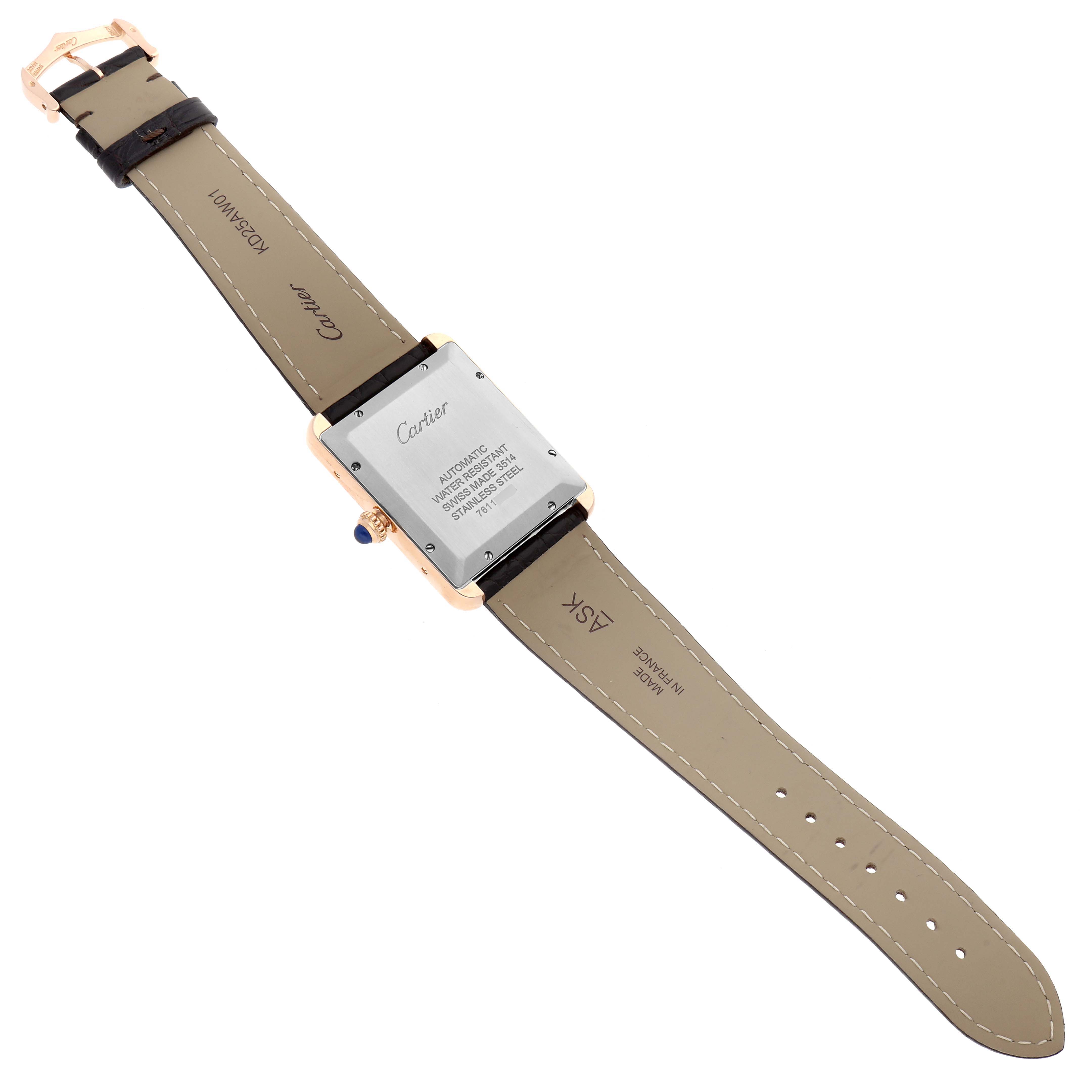 The image shows the back and strap of a Cartier Tank Solo W5200026 Men
s Steel and Gold (two tone) Silver Dial W5200026 Men
s Steel and Gold (two tone) Silver Dial watch, highlighting its details and inscriptions.