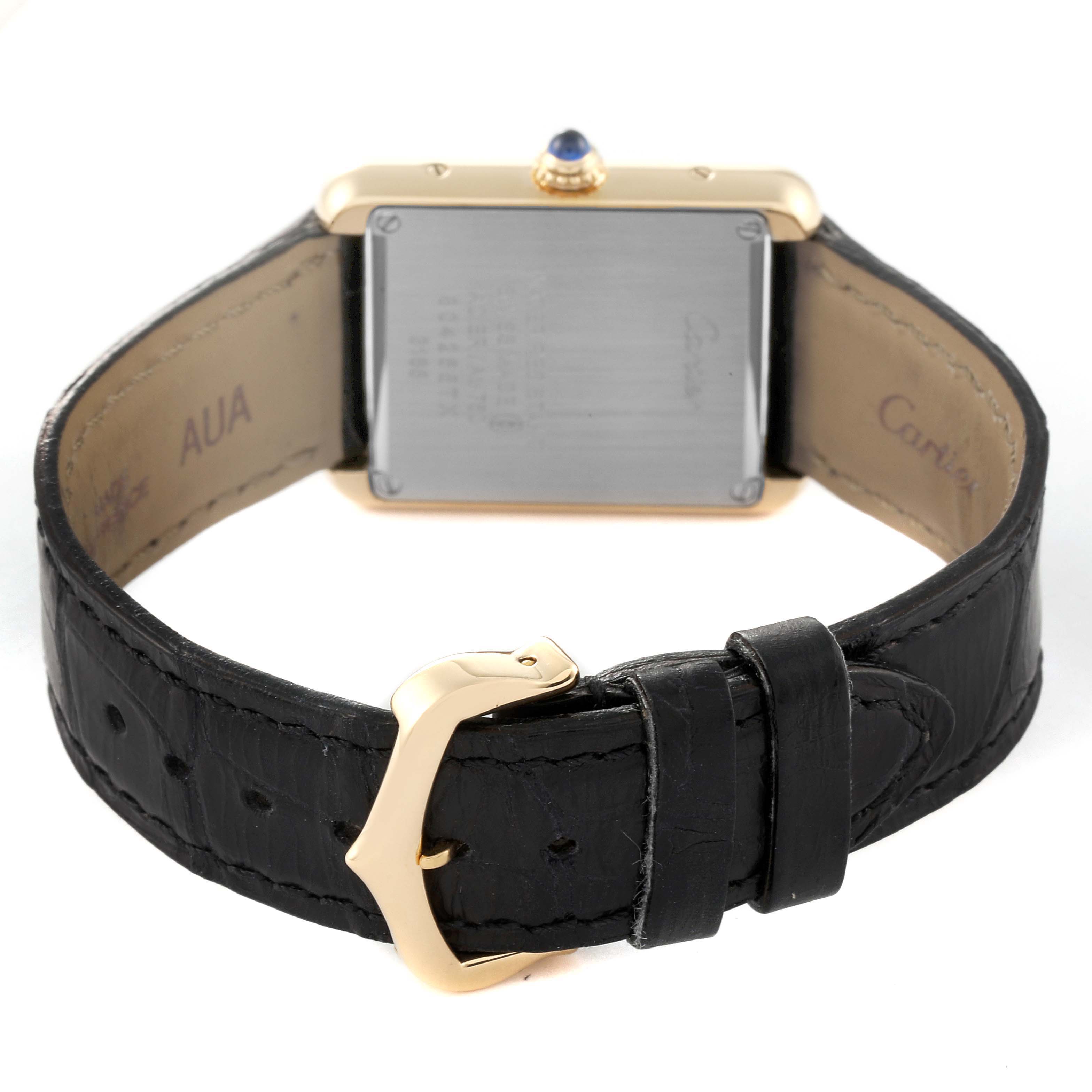 The image shows the back view of a Cartier Tank Solo W5200002 Women's Yellow Gold Silver Dial W5200002 Women's Yellow Gold Silver Dial watch with a black leather strap and gold clasp.