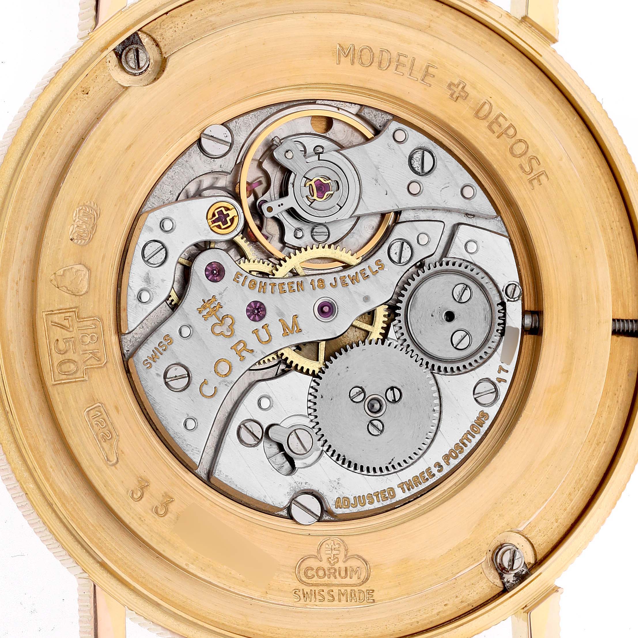 The image shows the back of a Corum Coin Watch 1896 Men's Yellow Gold Champagne Dial 1896 Men's Yellow Gold Champagne Dial model, highlighting its intricate movement and internal components.