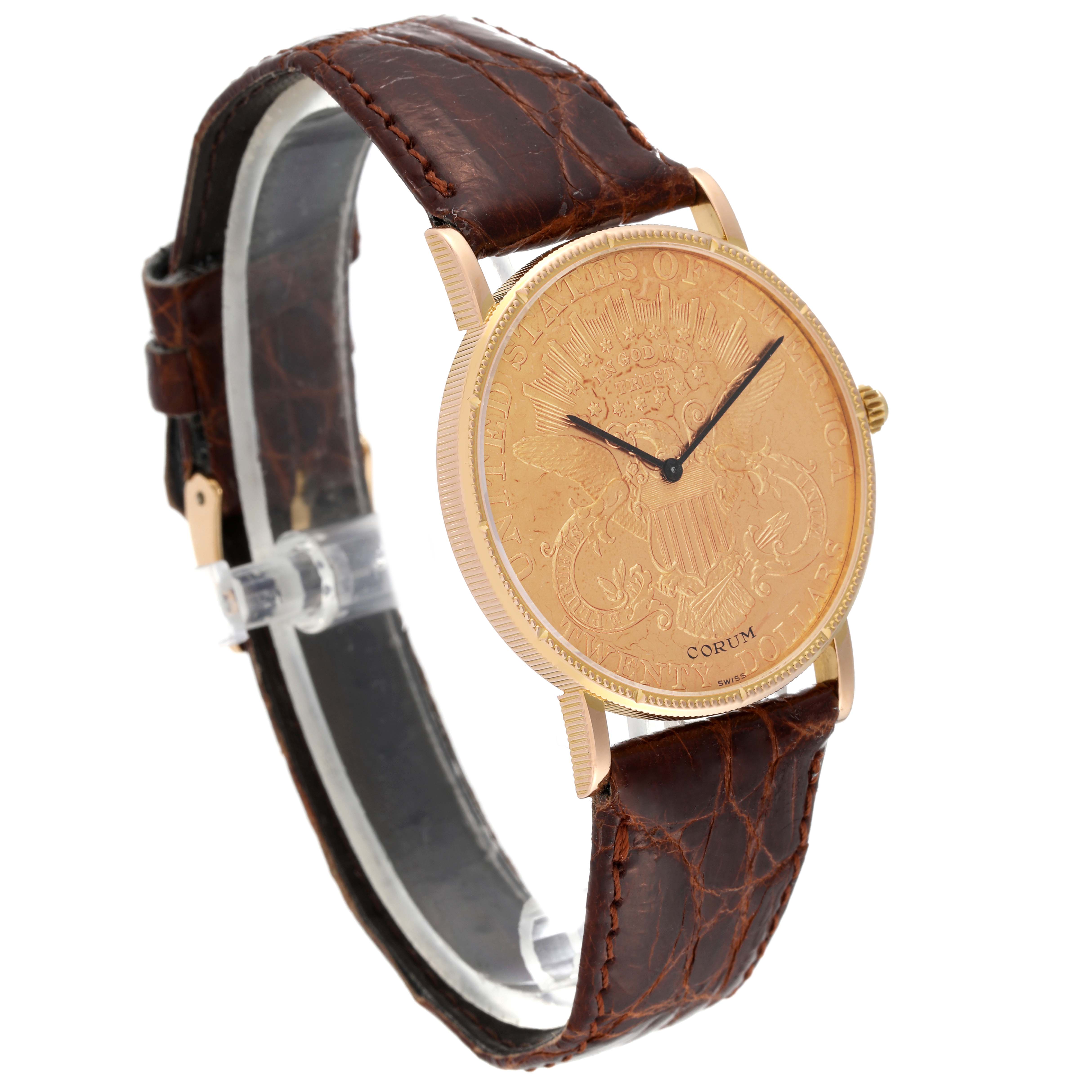 The Corum Coin Watch 1896 Men's Yellow Gold Champagne Dial 1896 Men's Yellow Gold Champagne Dial model is shown at a side angle, highlighting its gold coin face and brown leather strap.