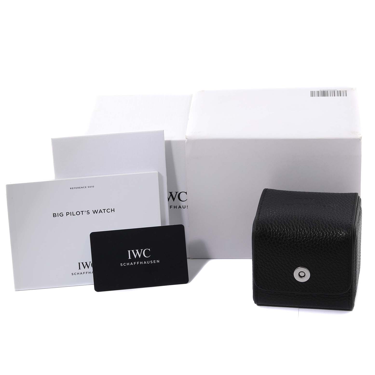 The image shows packaging, manuals, a card, and a case for an IWC Big Pilot
s Watch, but not the watch itself.