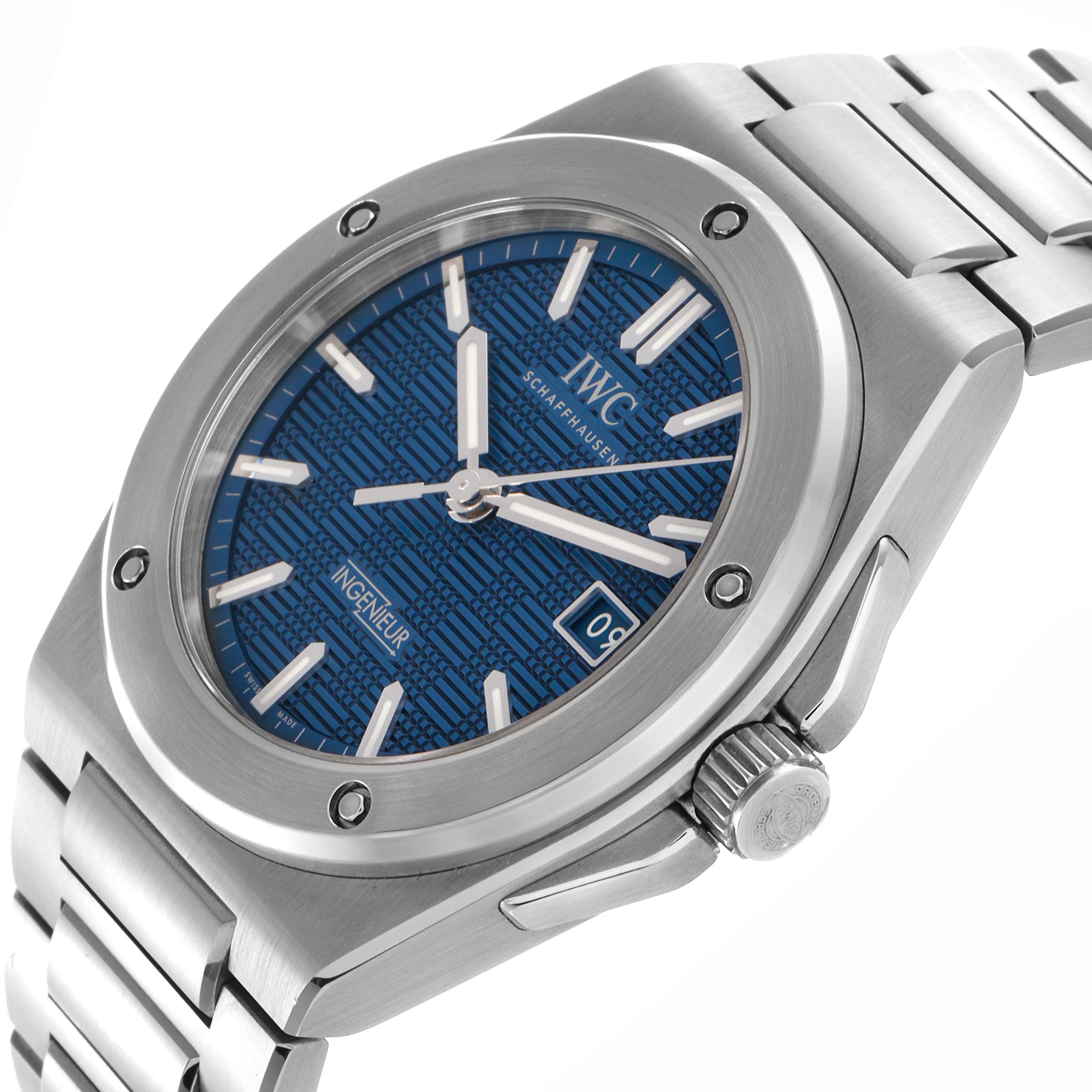 The IWC Ingenieur IW328907 Men
s Stainless Steel Blue Dial IW328907 Men
s Stainless Steel Blue Dial watch is shown at an angled view, displaying its blue textured dial, bezel, crown, and bracelet.