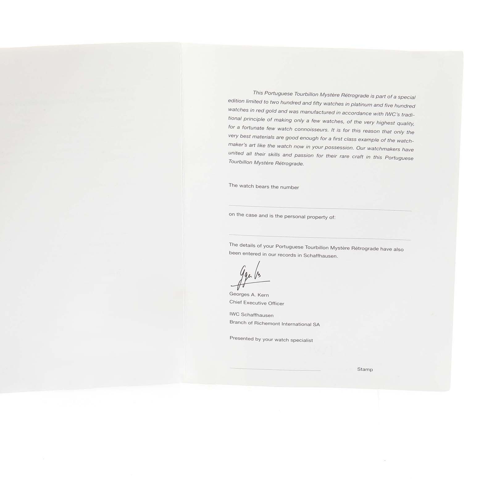 The image shows an open booklet with details about the IWC Portuguese IW504402 Men
s Rose Gold Silver Dial IW504402 Men
s Rose Gold Silver Dial Tourbillon Mystère Rétrograde watch.