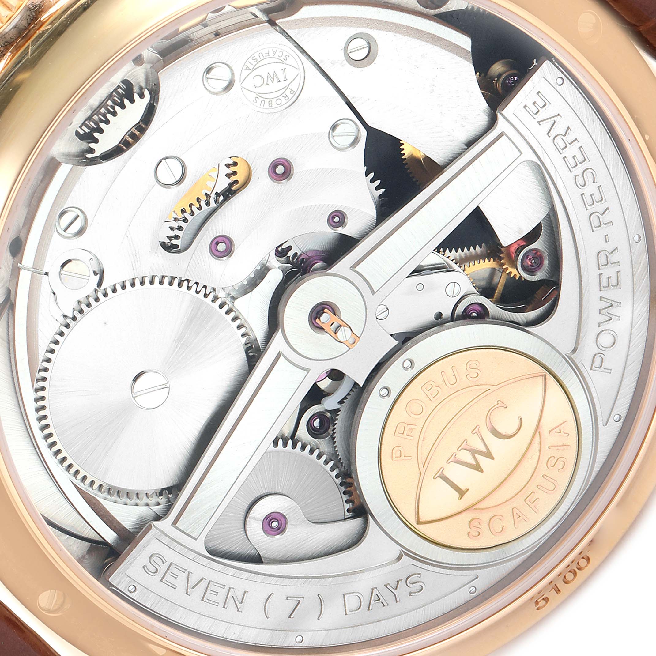 The image shows the back view of the movement and inner workings of an IWC Portuguese IW504402 Men
s Rose Gold Silver Dial IW504402 Men
s Rose Gold Silver Dial watch.