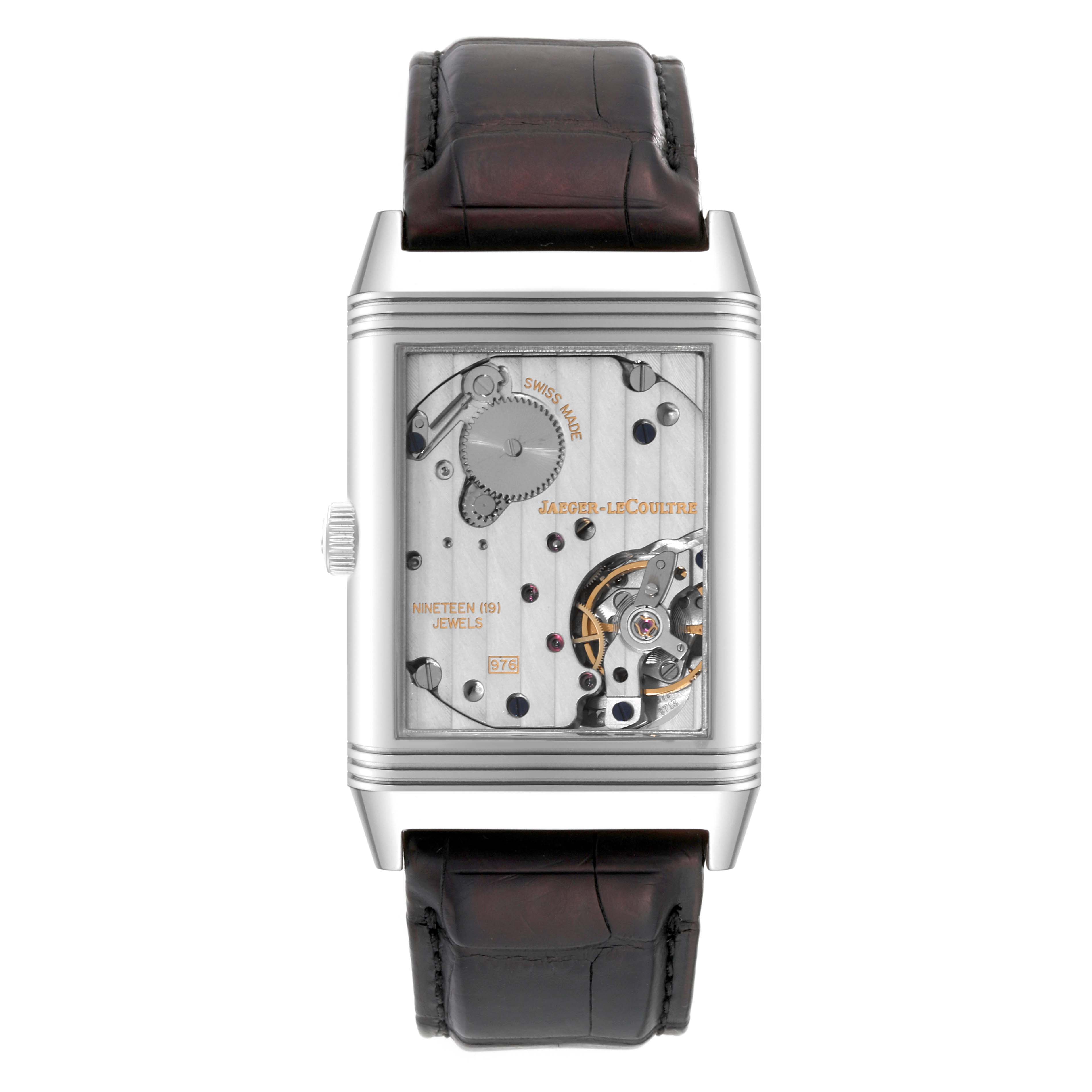 This image shows the front view of a Jaeger LeCoultre Reverso Q3738420 Men
s Stainless Steel Silver Dial Q3738420 Men
s Stainless Steel Silver Dial watch, highlighting its inner mechanism and leather strap.