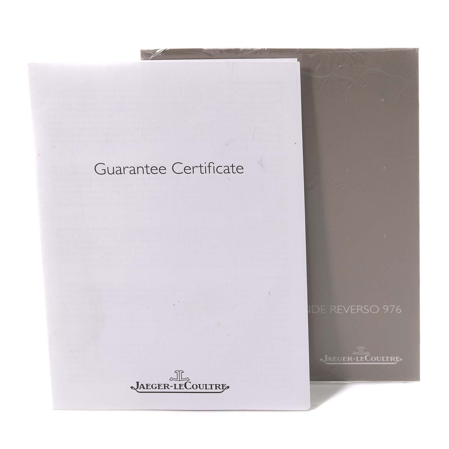 The image shows a Jaeger-LeCoultre Reverso model guarantee certificate and a booklet for "Grande Reverso 976."