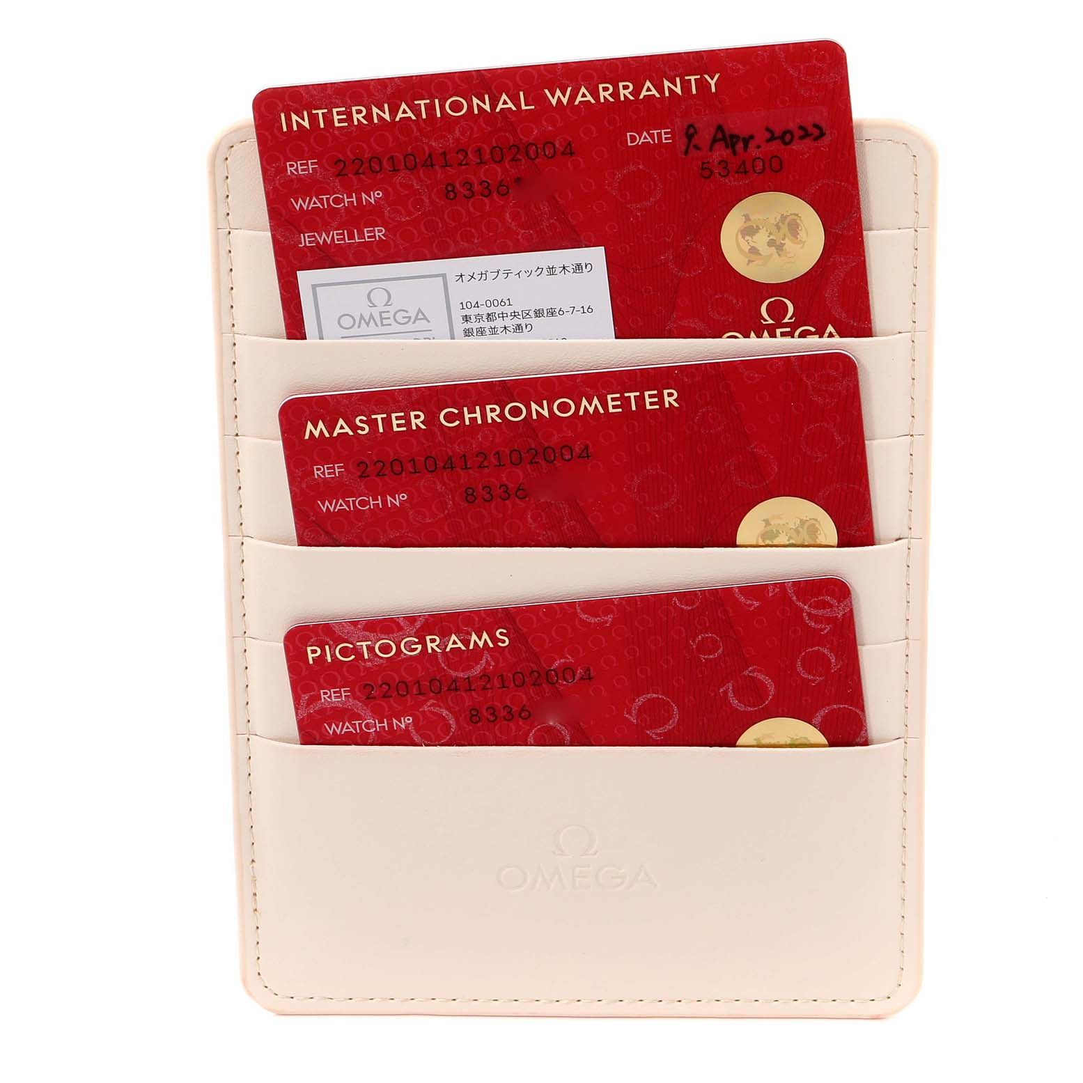 The image shows various certification and warranty cards for the Omega Aqua Terra 220.10.41.21.02.004 Men's Stainless Steel Silver Dial 220.10.41.21.02.004 Men's Stainless Steel Silver Dial watch, placed in a beige cardholder.