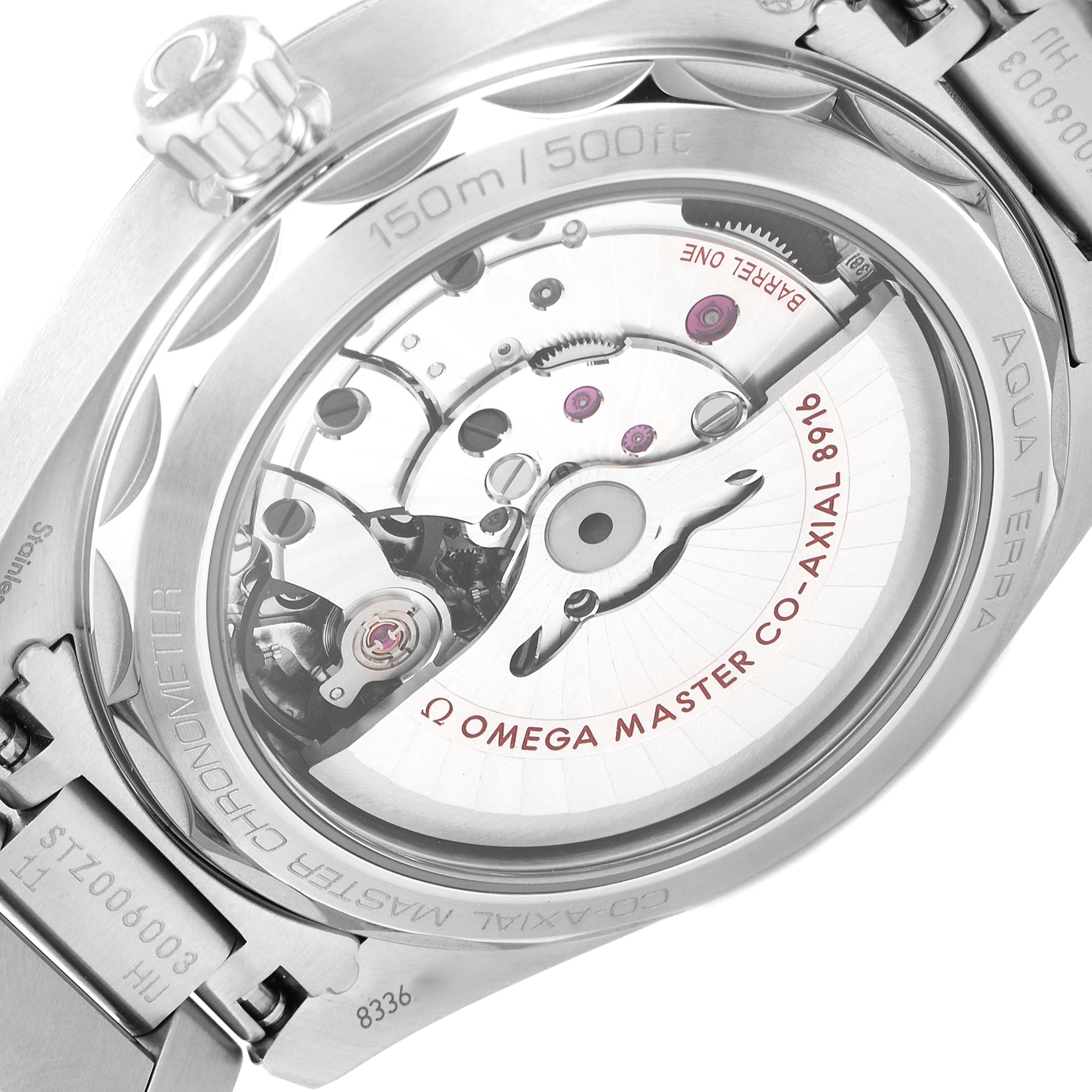 This image shows the back of the Omega Aqua Terra 220.10.41.21.02.004 Men's Stainless Steel Silver Dial 220.10.41.21.02.004 Men's Stainless Steel Silver Dial watch, highlighting its inner mechanical movement and stainless steel case.