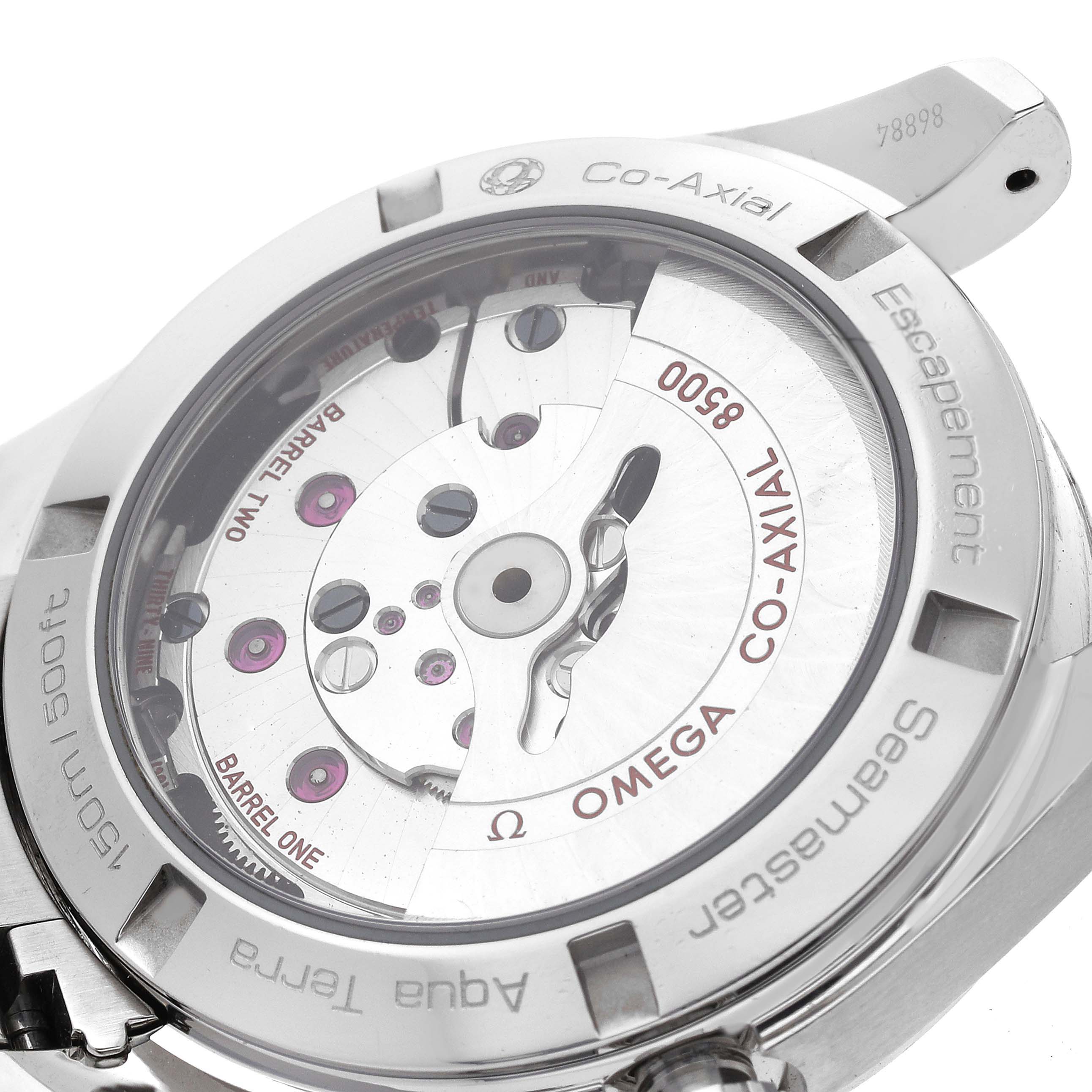 The image shows the back view of the Omega Aqua Terra 231.10.39.21.03.001 Men
s Stainless Steel Blue Dial 231.10.39.21.03.001 Men
s Stainless Steel Blue Dial watch, revealing its Co-Axial escapement mechanism.