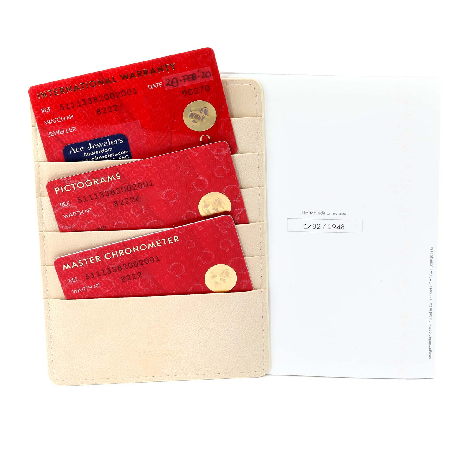 The image shows the international warranty cards, pictograms, and master chronometer cards for the Omega Seamaster 511.13.38.20.02.001 Men's Stainless Steel Silver Dial 511.13.38.20.02.001 Men's Stainless Steel Silver Dial model.