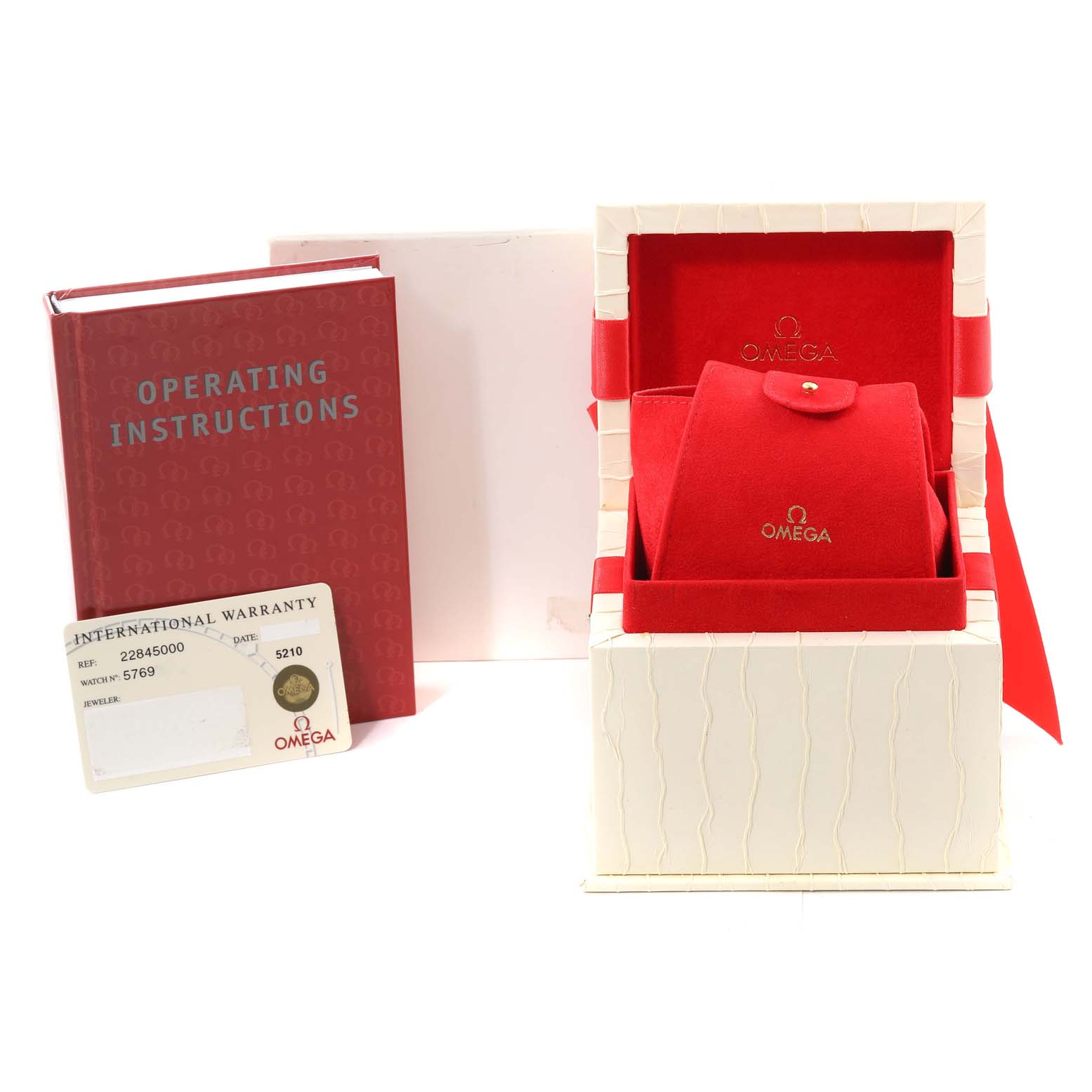 The image shows the packaging, warranty card, and operating instructions for an Omega 2284.50.00 Women's Stainless Steel Black Dial 2284.50.00 Women's Stainless Steel Black Dial Seamaster Diver 300M 28mm Steel Ladies Watch 2284.50.00.