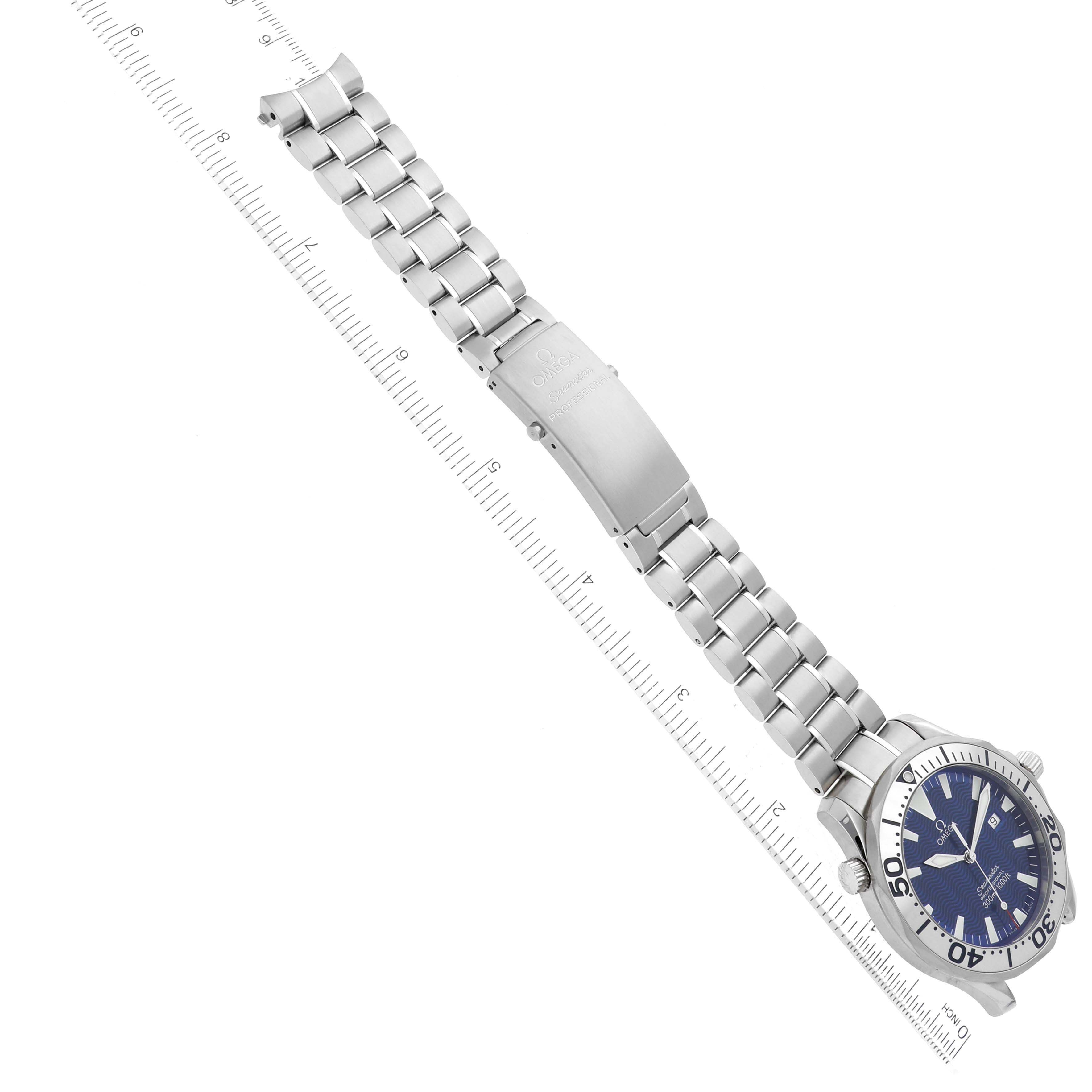 The image shows an Omega Seamaster 2265.80.00 Men
s Stainless Steel Blue Dial 2265.80.00 Men
s Stainless Steel Blue Dial watch laid flat, displaying the metal bracelet, clasp, and face at an angle.