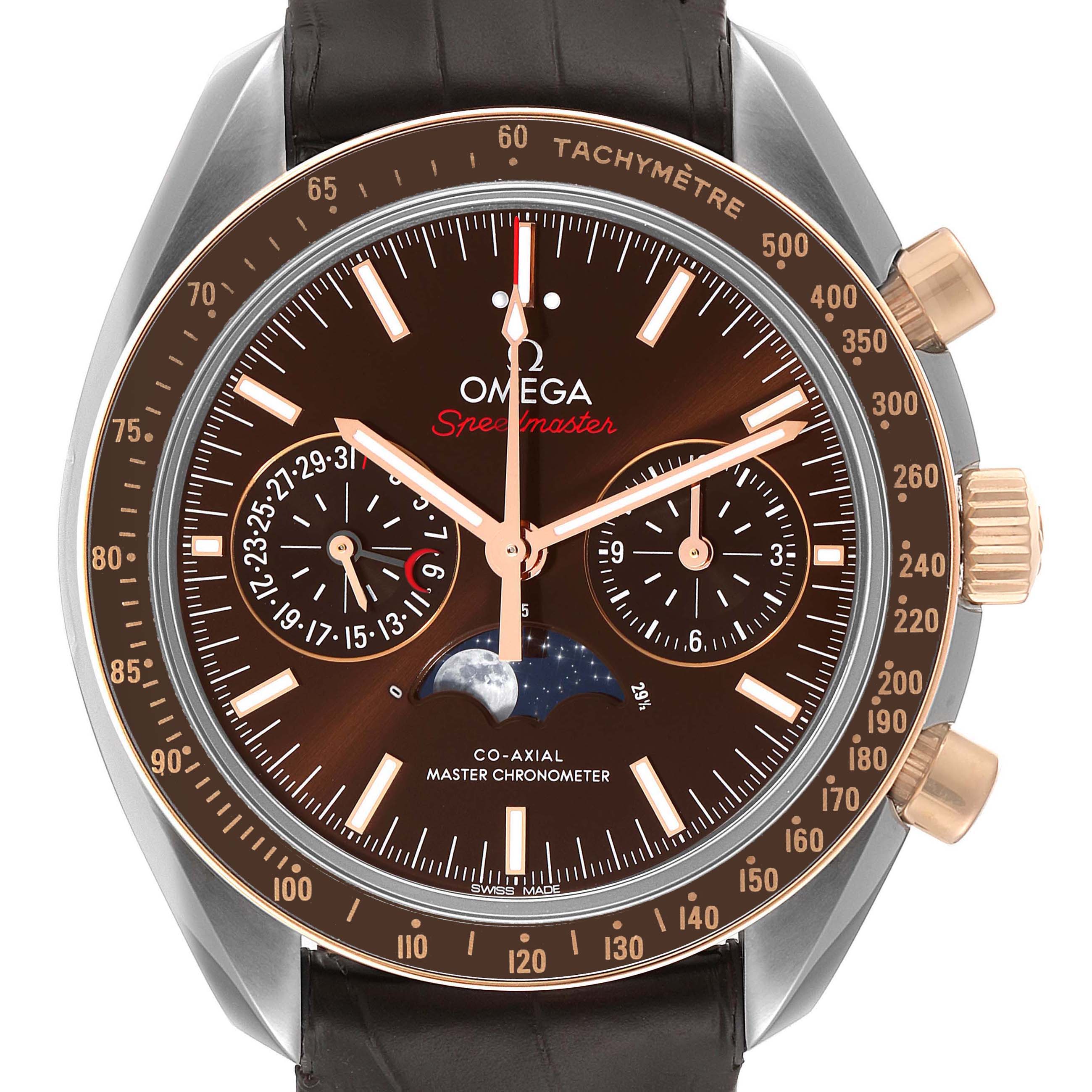 This is the Omega Speedmaster 304.23.44.52.13.001 Men's Steel and Gold (two tone) Brown Dial 304.23.44.52.13.001 Men's Steel and Gold (two tone) Brown Dial watch shown from the front, displaying its face, sub-dials, and tachymeter bezel.