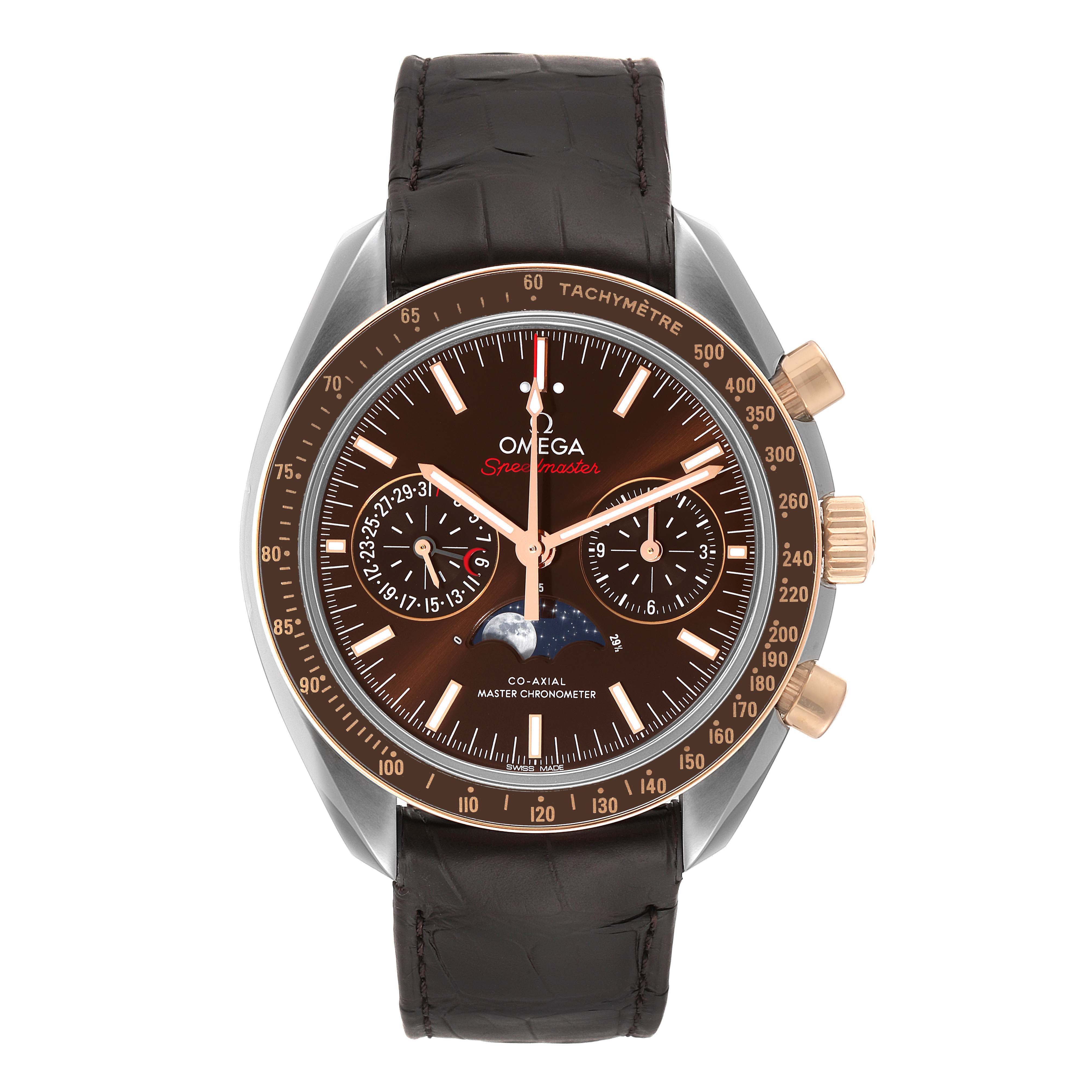 The Omega Speedmaster 304.23.44.52.13.001 Men's Steel and Gold (two tone) Brown Dial 304.23.44.52.13.001 Men's Steel and Gold (two tone) Brown Dial watch is shown from a front angle, displaying the dial, bezel, and strap.