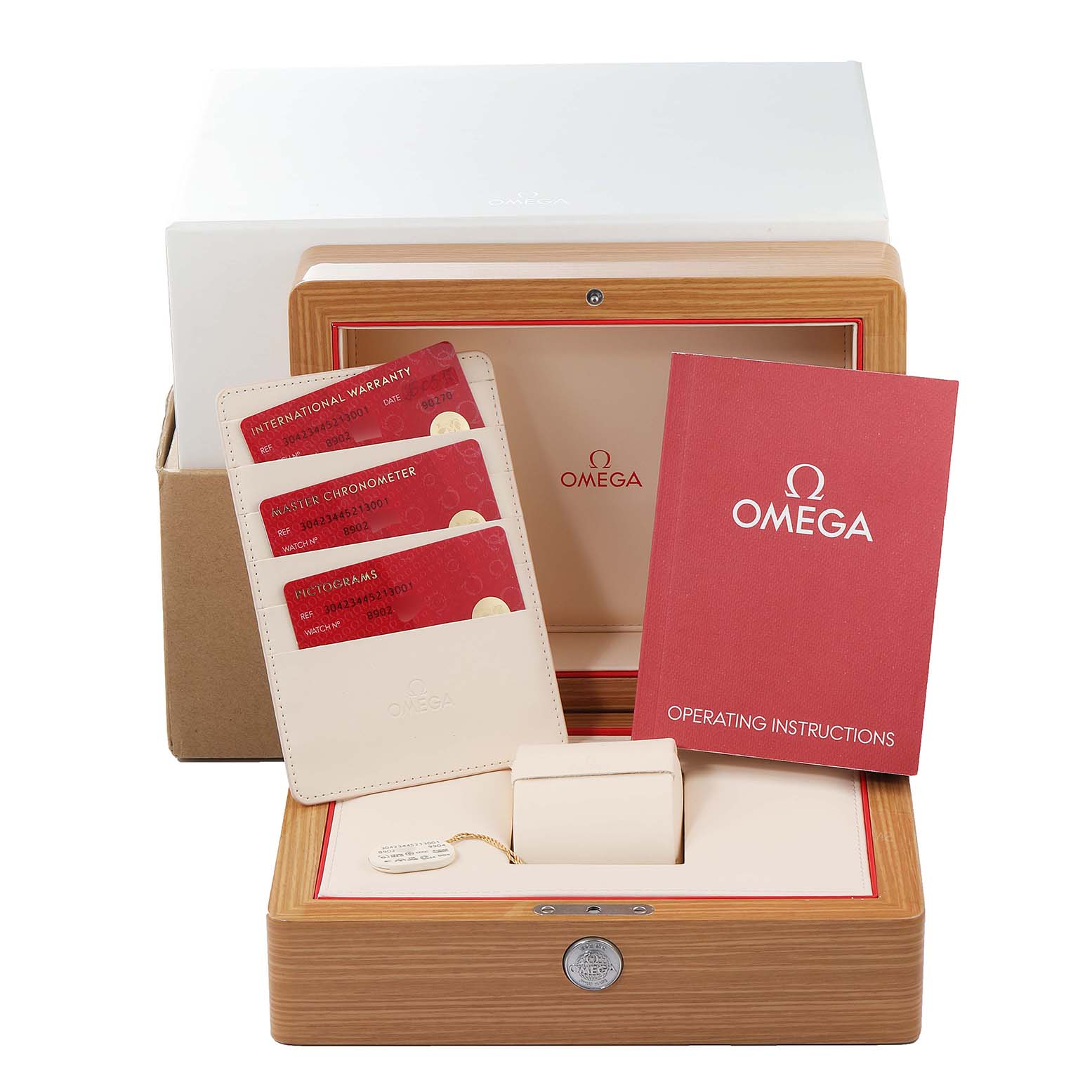 The image shows the packaging and accessories for an Omega Speedmaster 304.23.44.52.13.001 Men's Steel and Gold (two tone) Brown Dial 304.23.44.52.13.001 Men's Steel and Gold (two tone) Brown Dial, including manuals, warranty cards, and a wooden box.