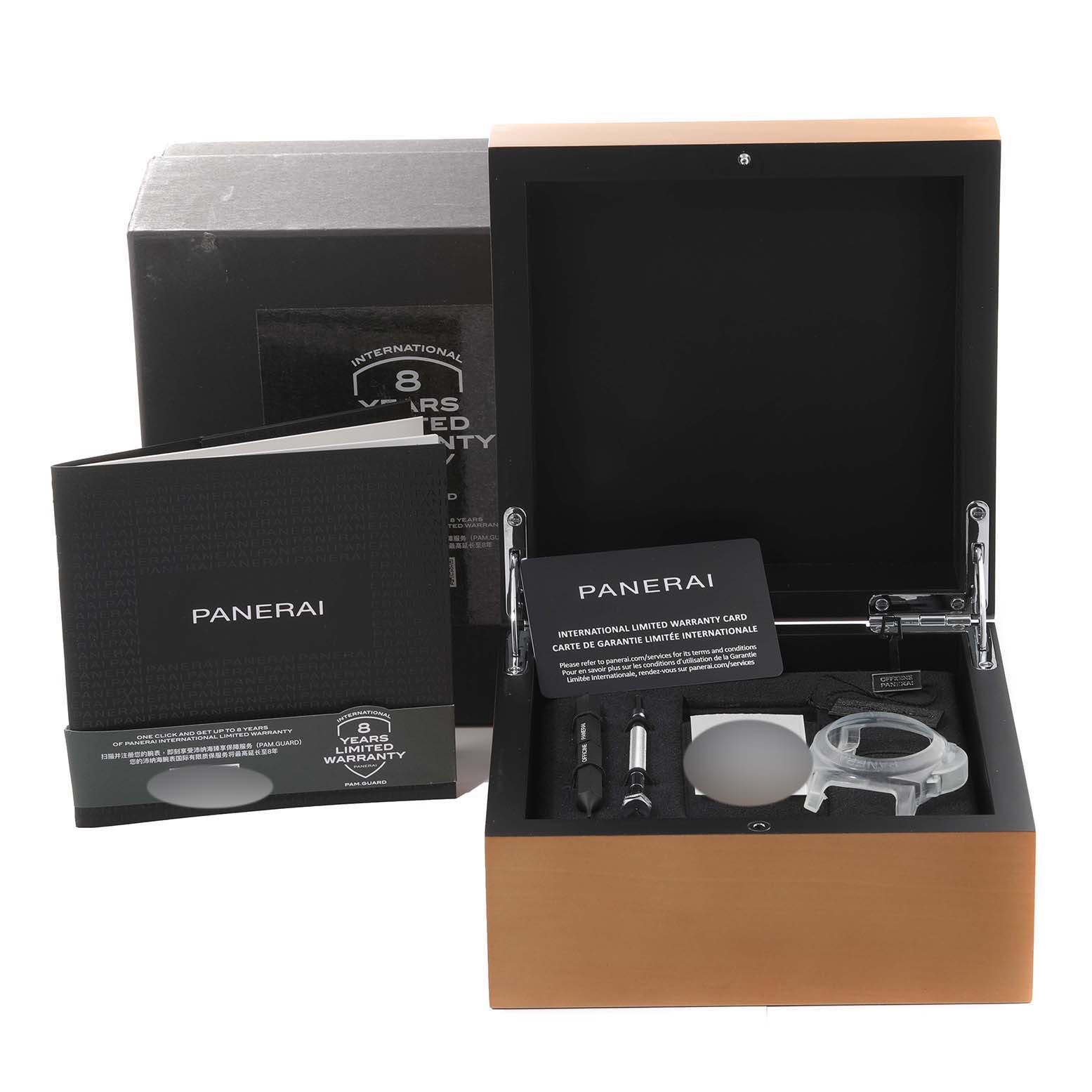 The image shows a Panerai Luminor PAM01296 Men's Stainless Steel Green Dial PAM01296 Men's Stainless Steel Green Dial watch packaging box with accessories, including tools and warranty cards, from a front angle.